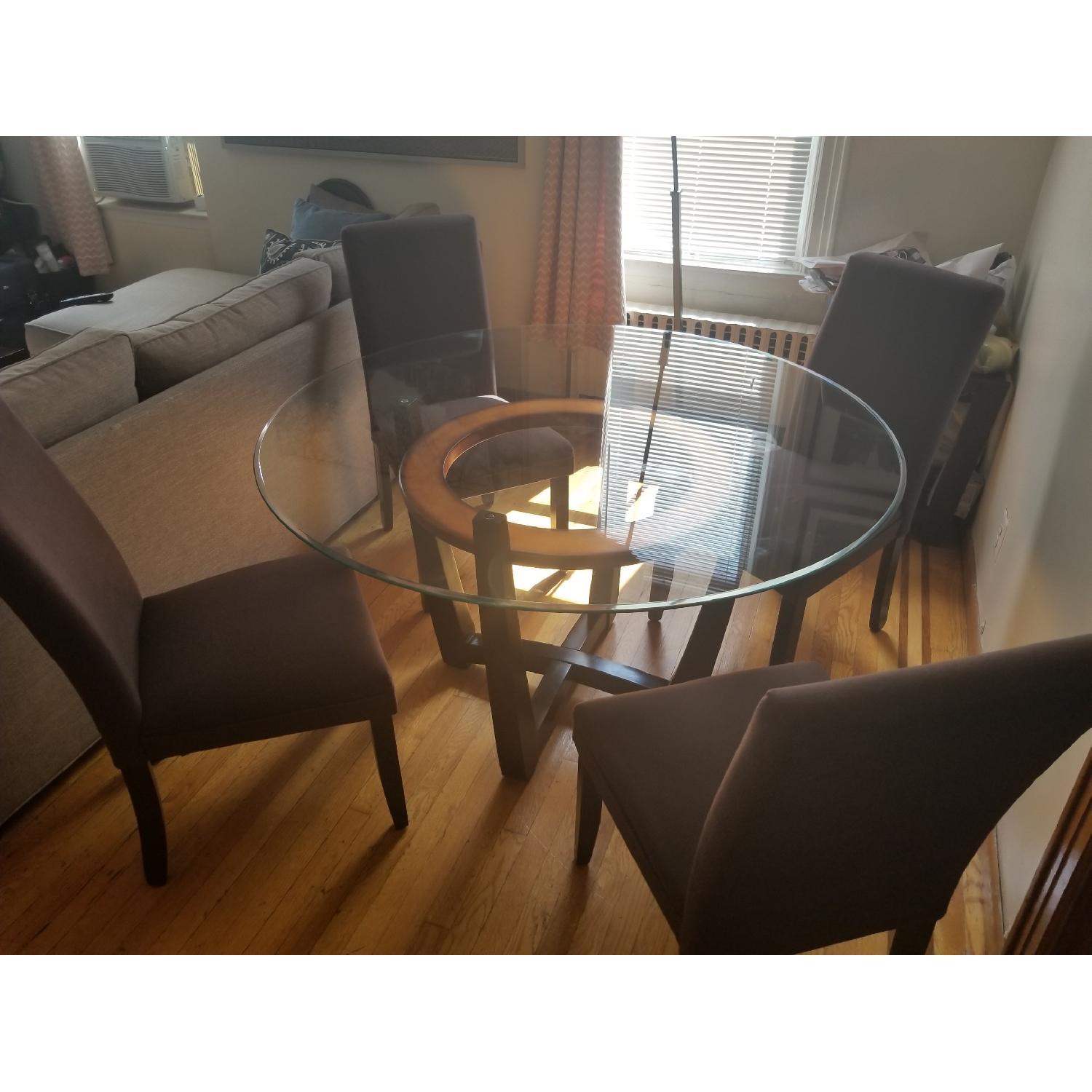 Macy's Modern Round Glass Dining Table w/ 4 Chairs AptDeco