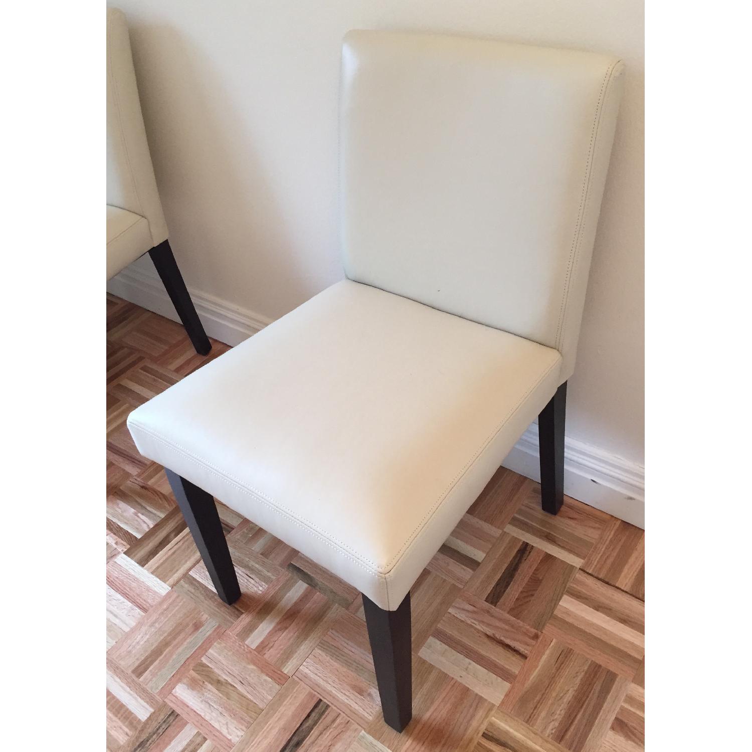 West Elm Ivory Leather & Wooden Dining Chairs AptDeco