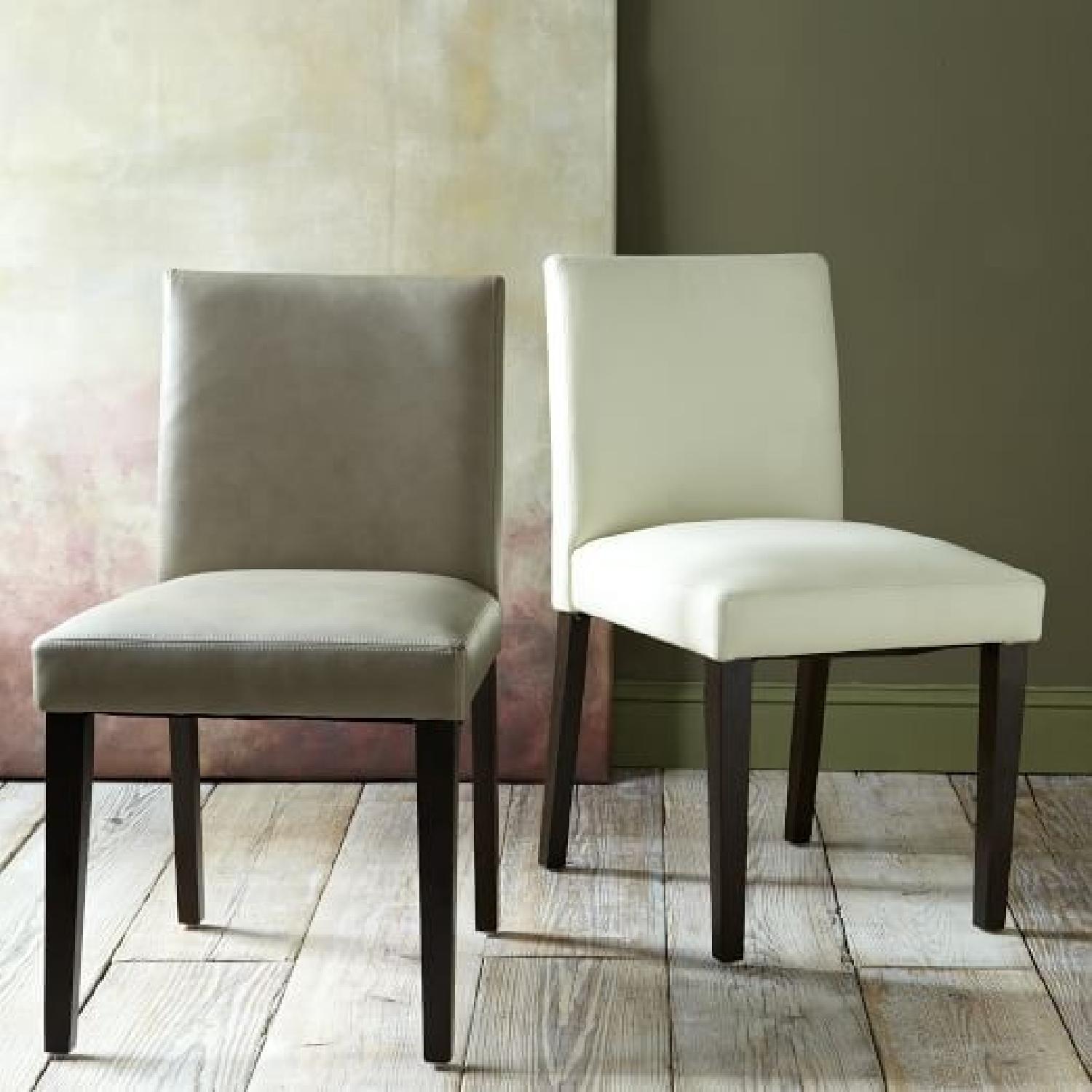 West Elm Ivory Leather & Wooden Dining Chairs AptDeco