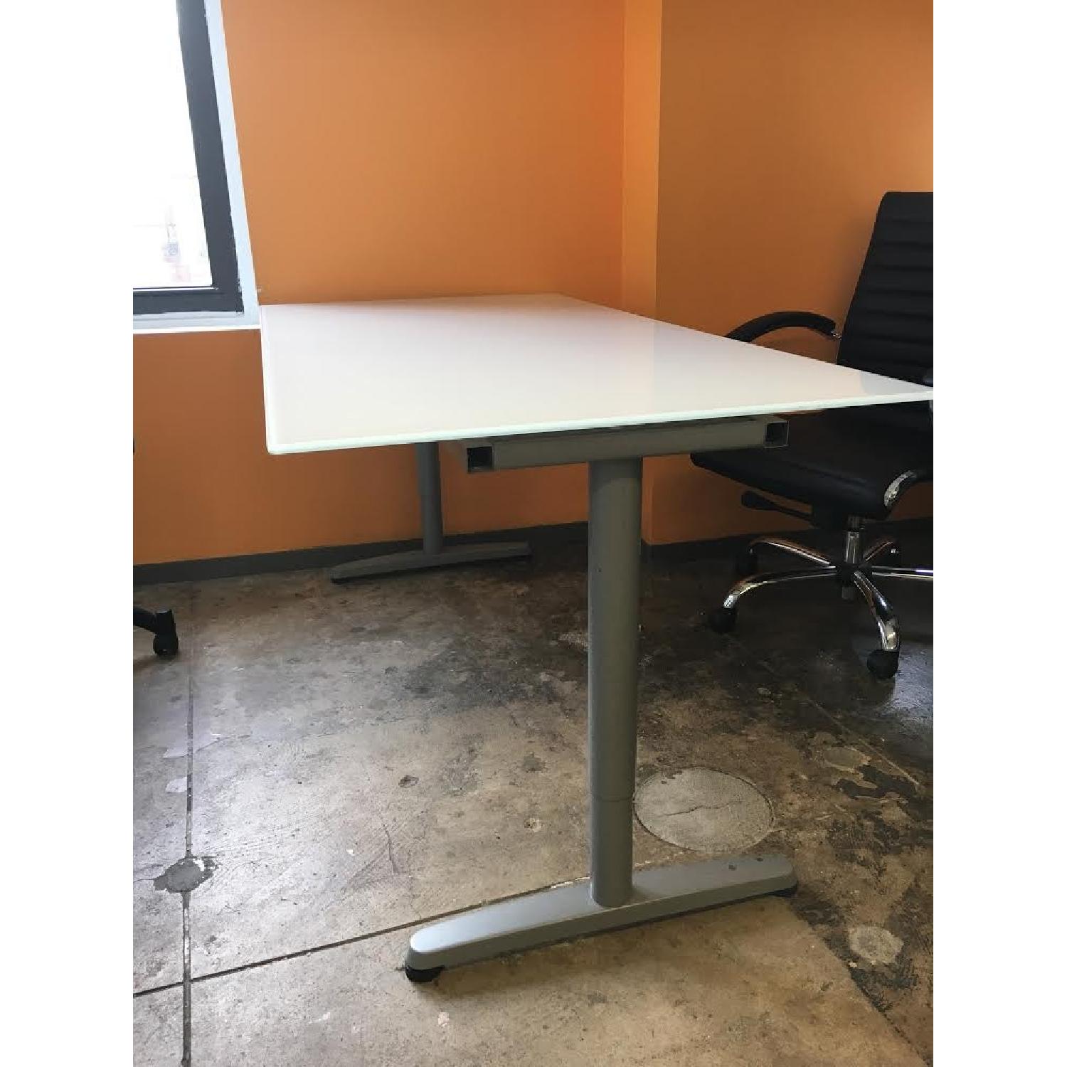 Ikea Adjustable-Height Glass Top Desk - image-1