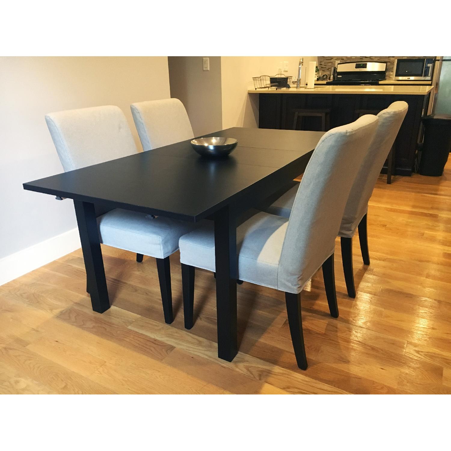 Ikea Extendable Dining Table w/ 4 Upholstered Chairs AptDeco
