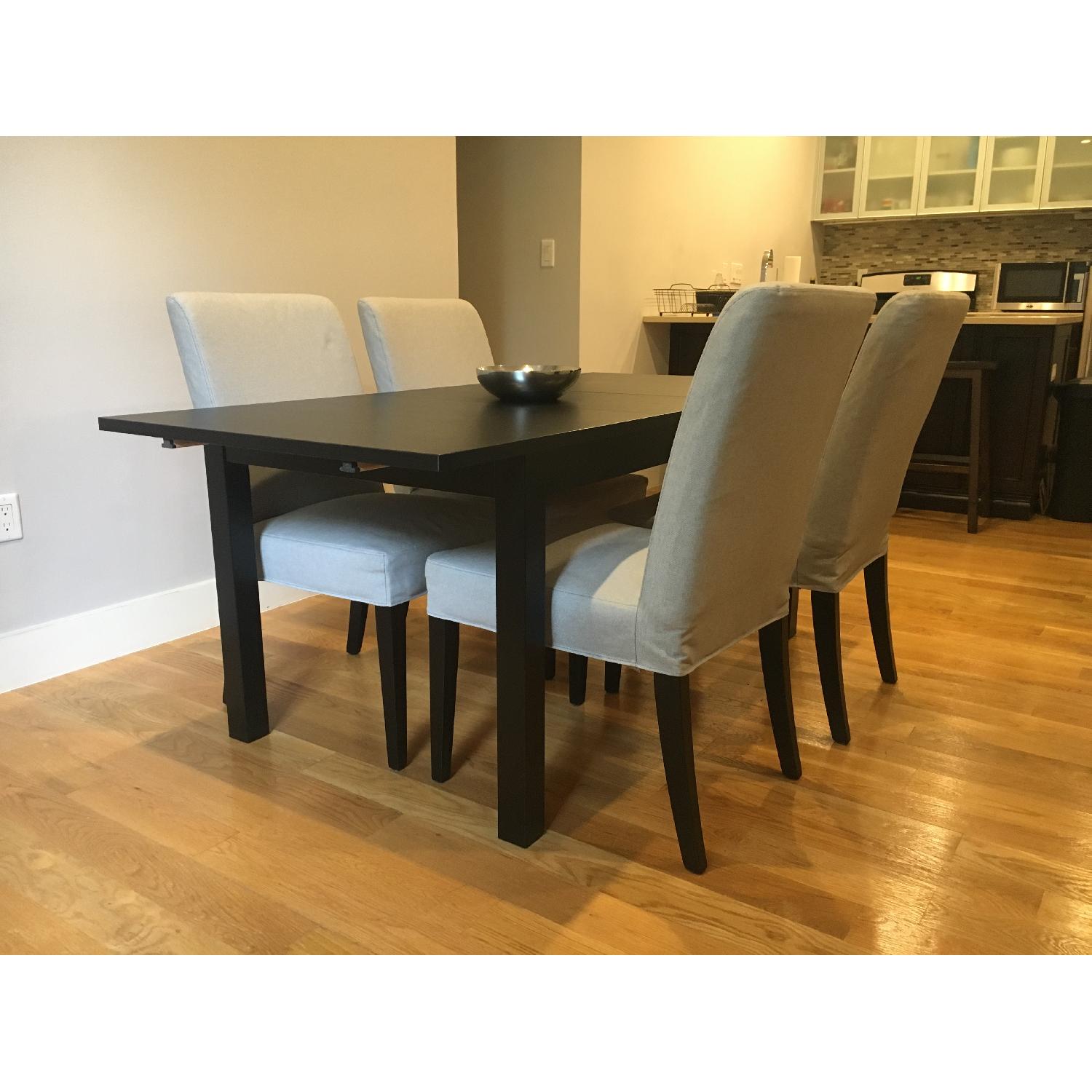 Ikea Extendable Dining Table w/ 4 Upholstered Chairs AptDeco