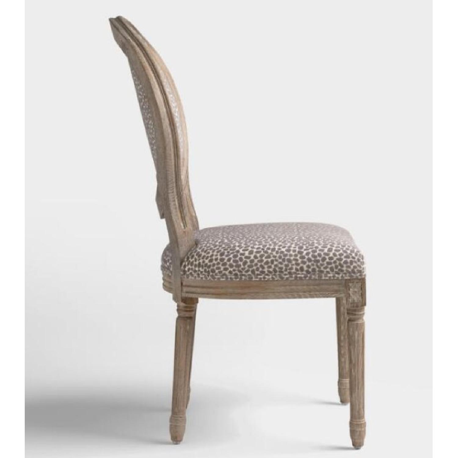 World Market Paige Round Back Dining Chairs AptDeco