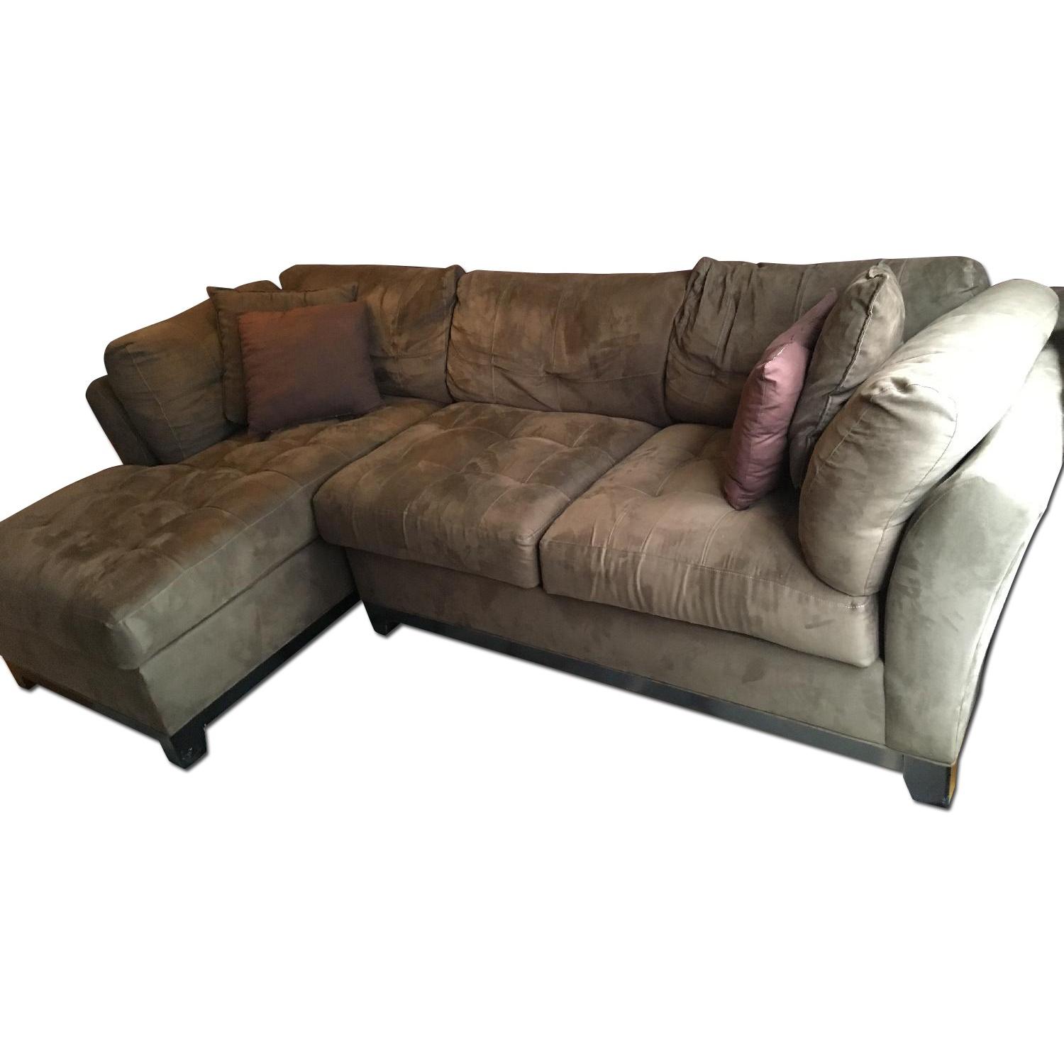 Raymour & Flanigan Sectional Couch - image-0