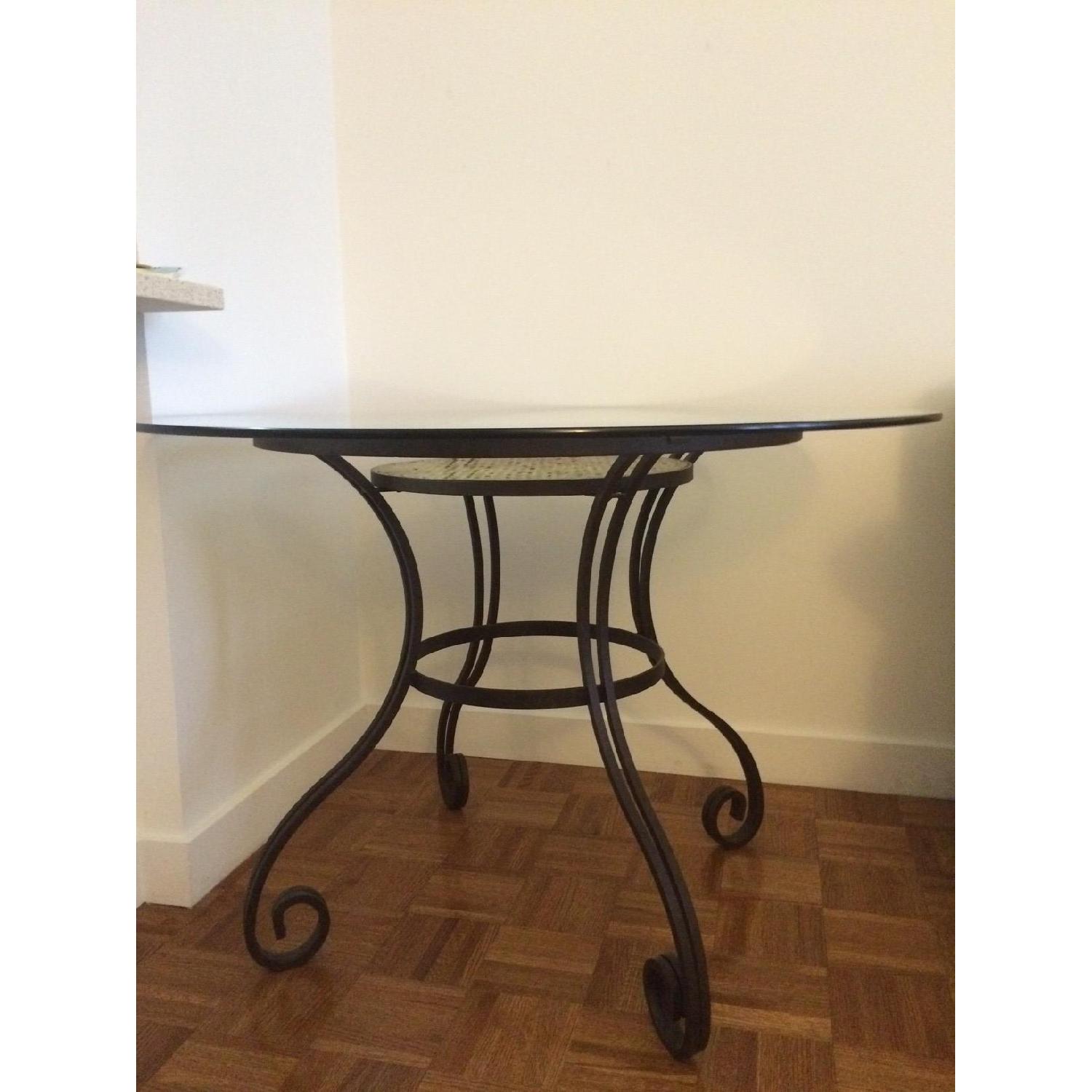 Pier 1 Glass Top Dining Table w/ Wrought Iron Base AptDeco