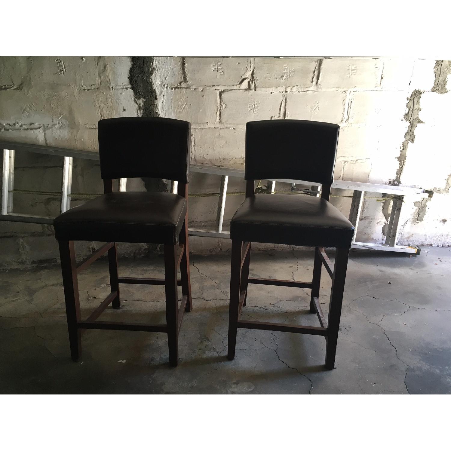 Pier 1 Faux Leather Counter Height Dining Chairs - image-1