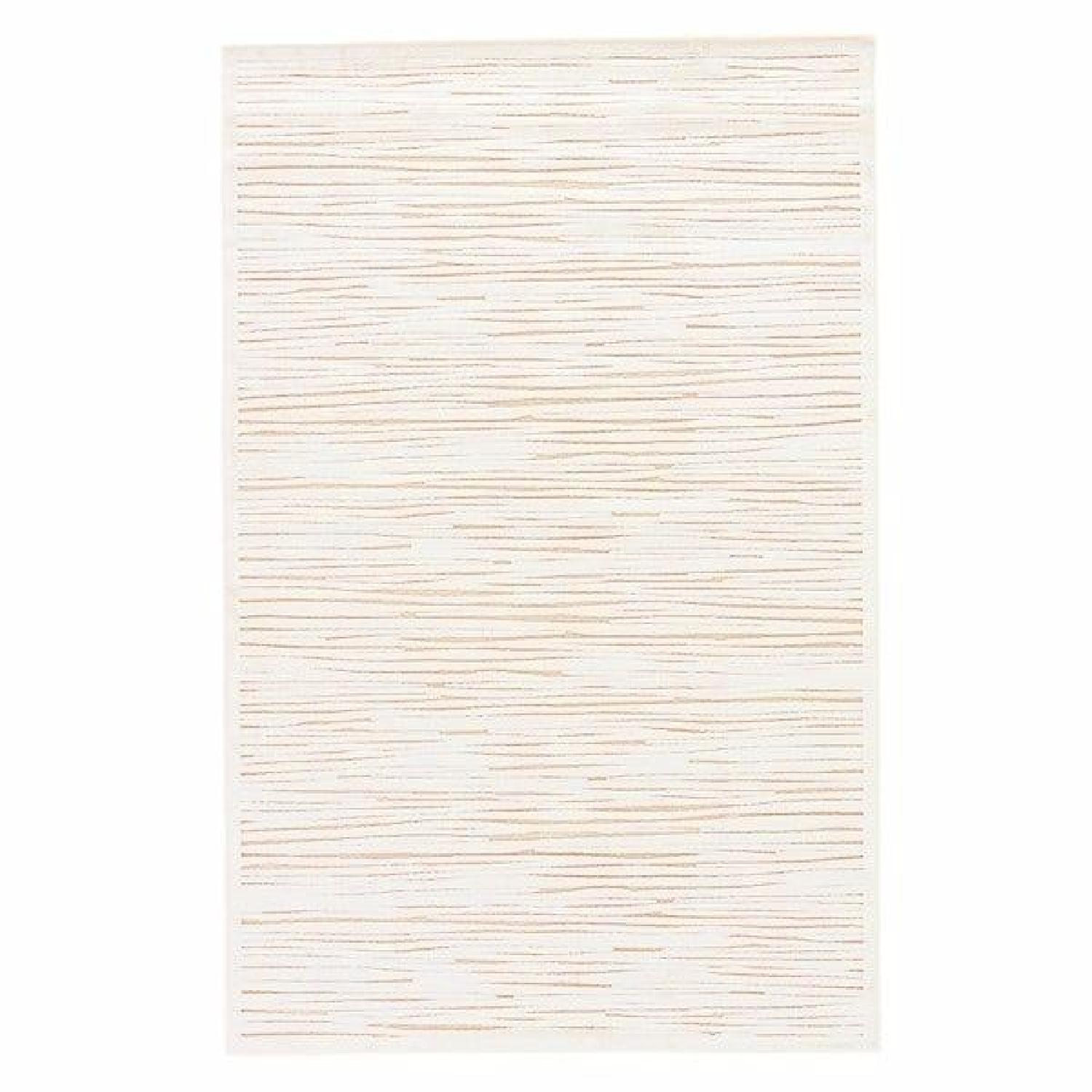 White Abstract Pattern Area Rug Raya Abstract White Area Rug - AptDeco