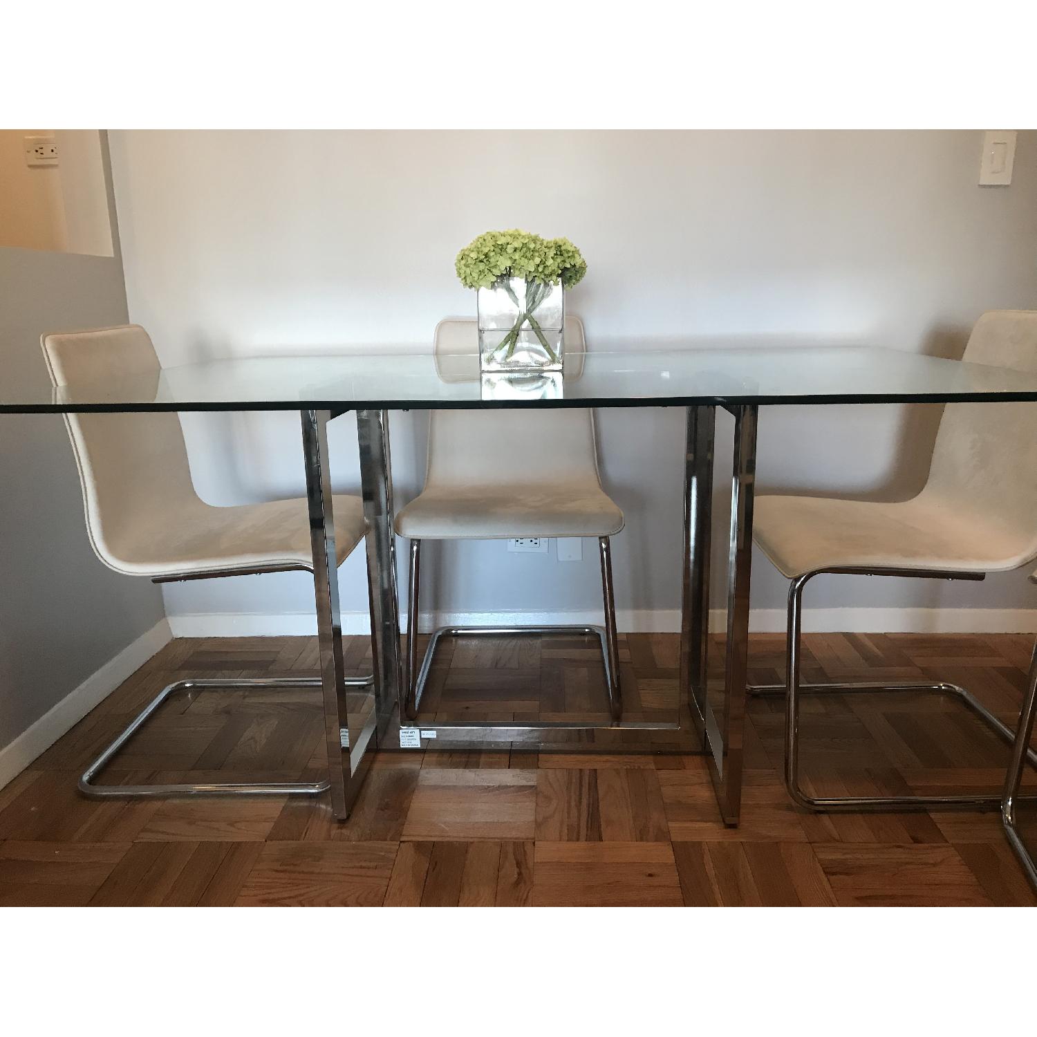West Elm Glass/Chrome Dining Table w/ 4 CB2 Chairs - AptDeco