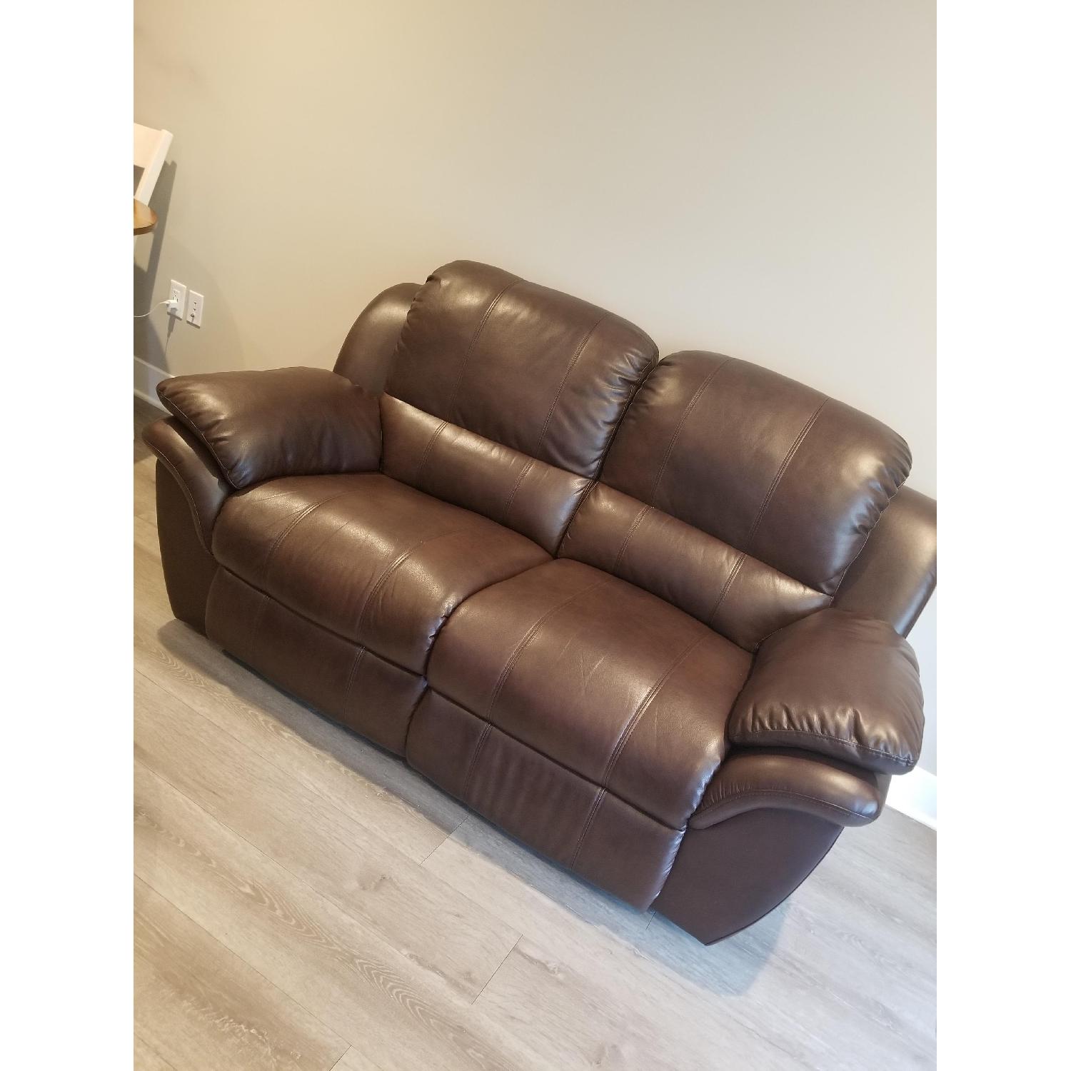 Raymour & Flanigan Brown Leather Loveseat + Recliner - image-1