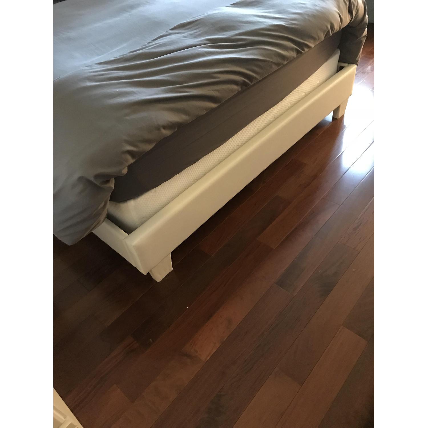 Ashley Upholstered Queen Panel Bed - image-2