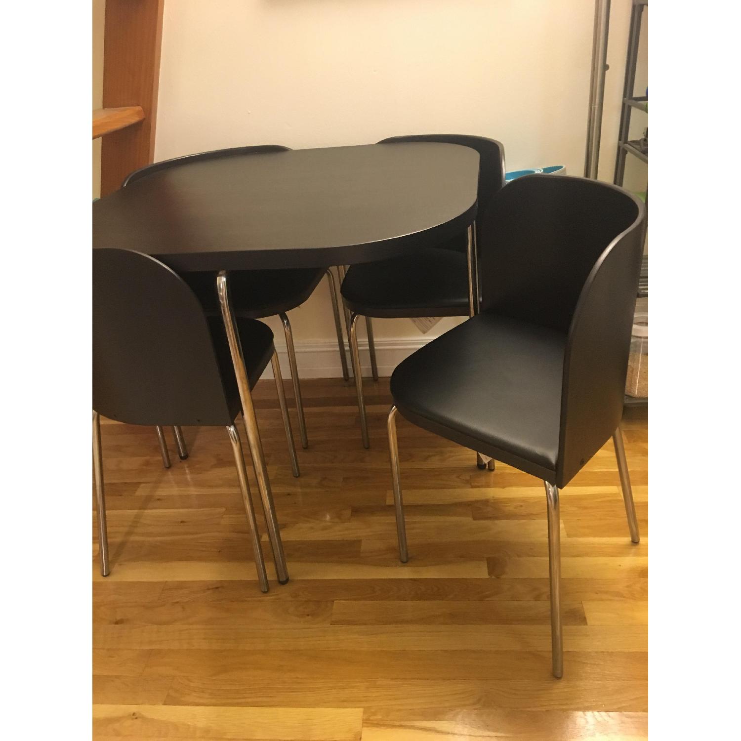 Ikea Dining Table w/ 4 Chairs - AptDeco
