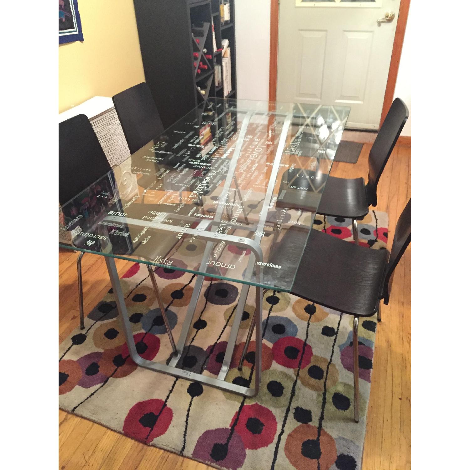 Ikea Glass Dining Table w/ 4 Black Martin Chairs - AptDeco