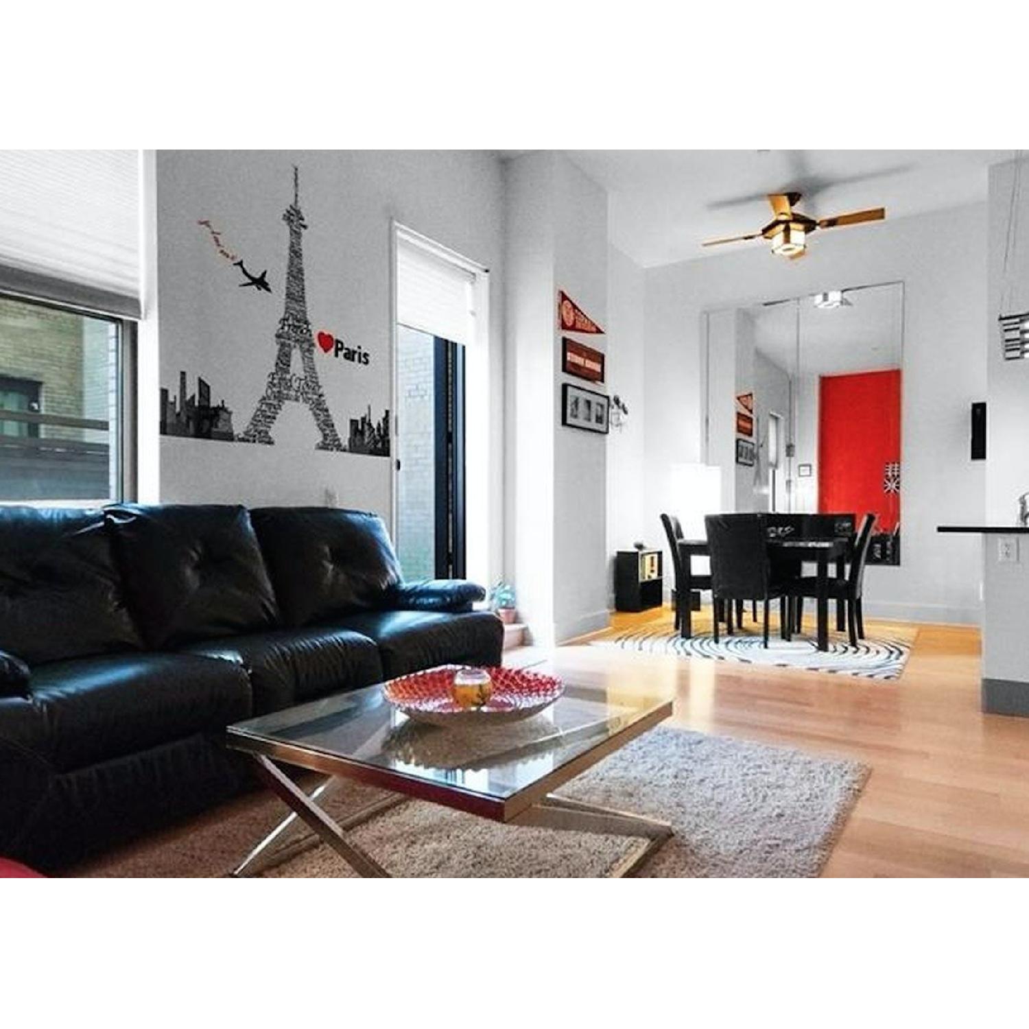 Ashley's Clear Glass Coffee Table - image-1