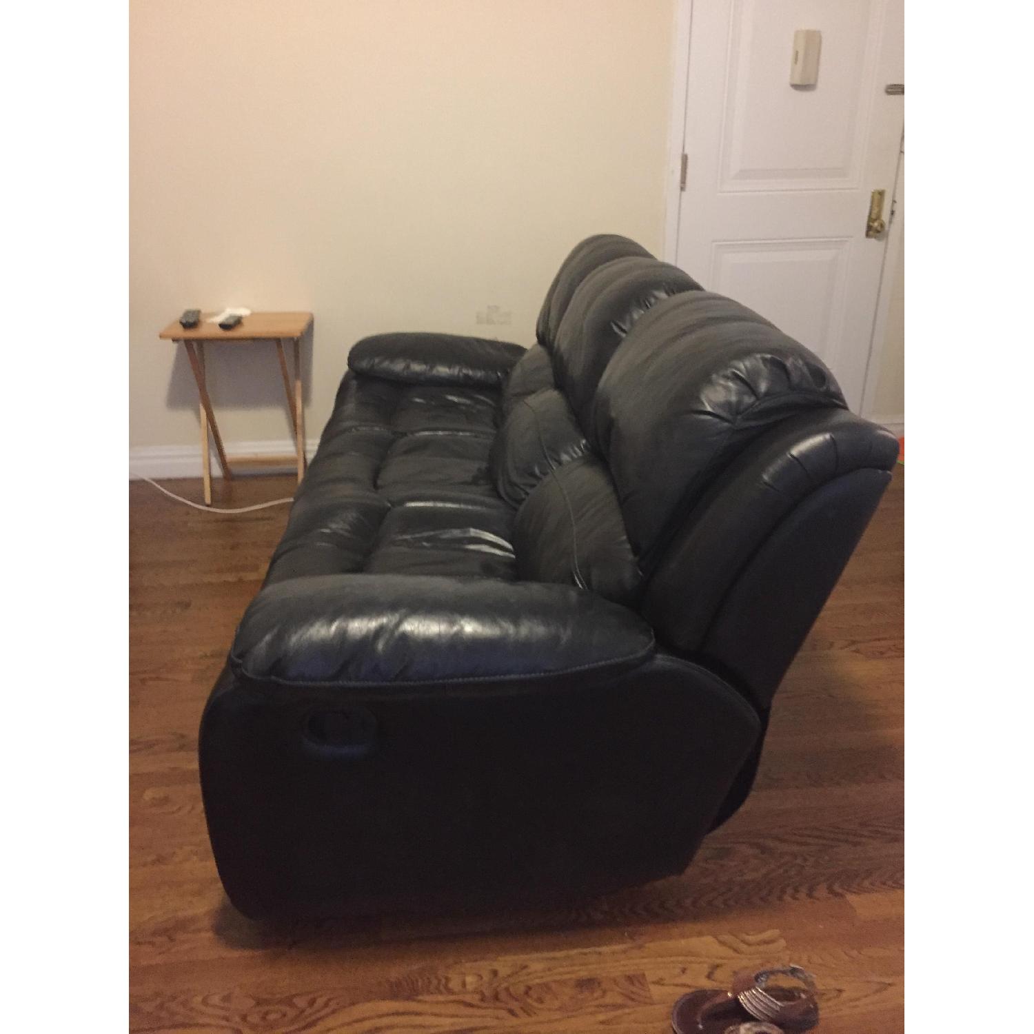 Raymour and Flanigan Black Bryant Reclining Sofa - image-9