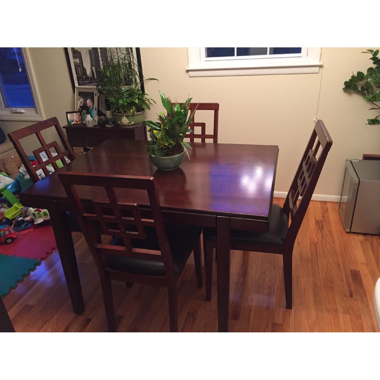 Dining Table w/ 4 Upholstered Chairs - AptDeco