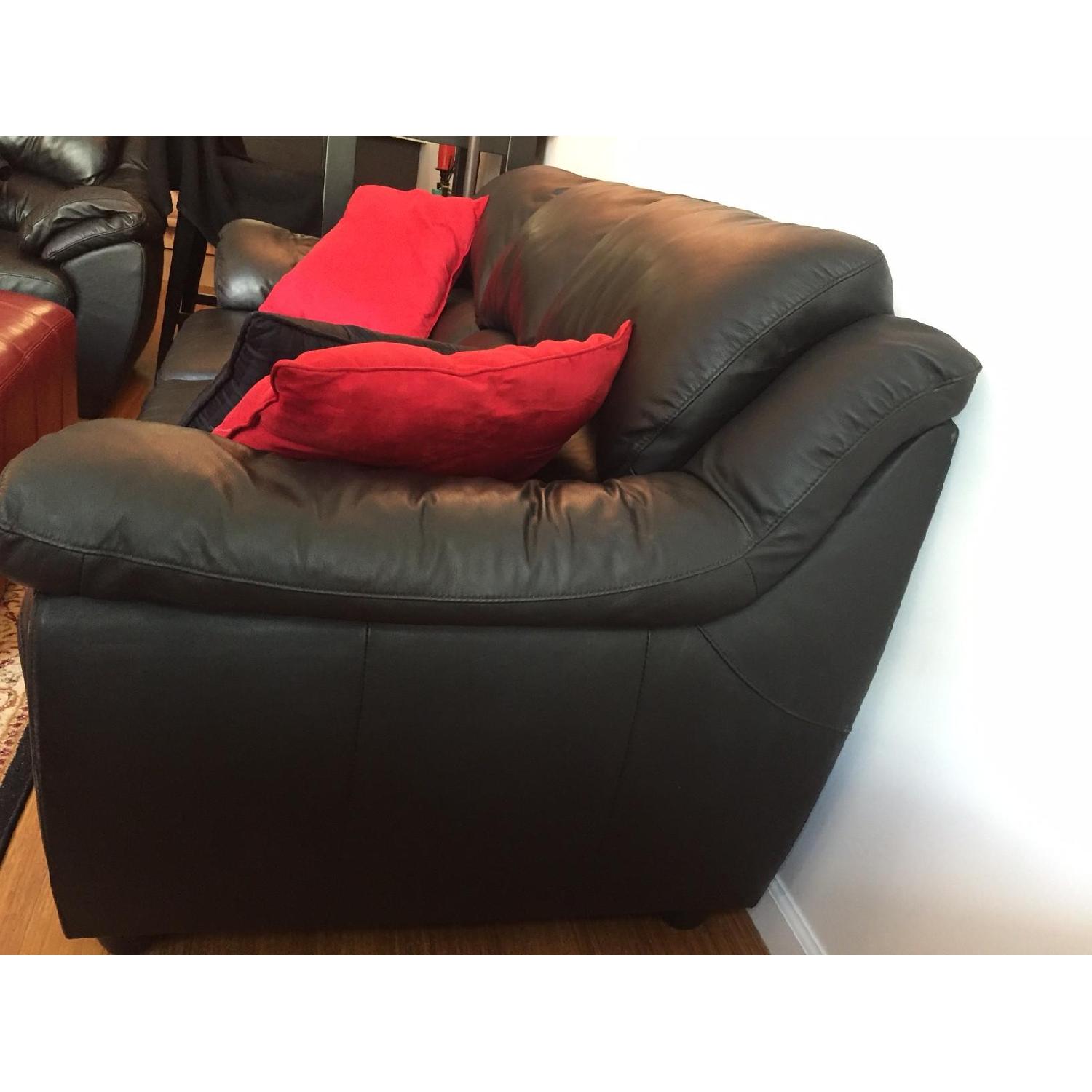 Raymour & Flanigan Black FauxLeather Sofa AptDeco