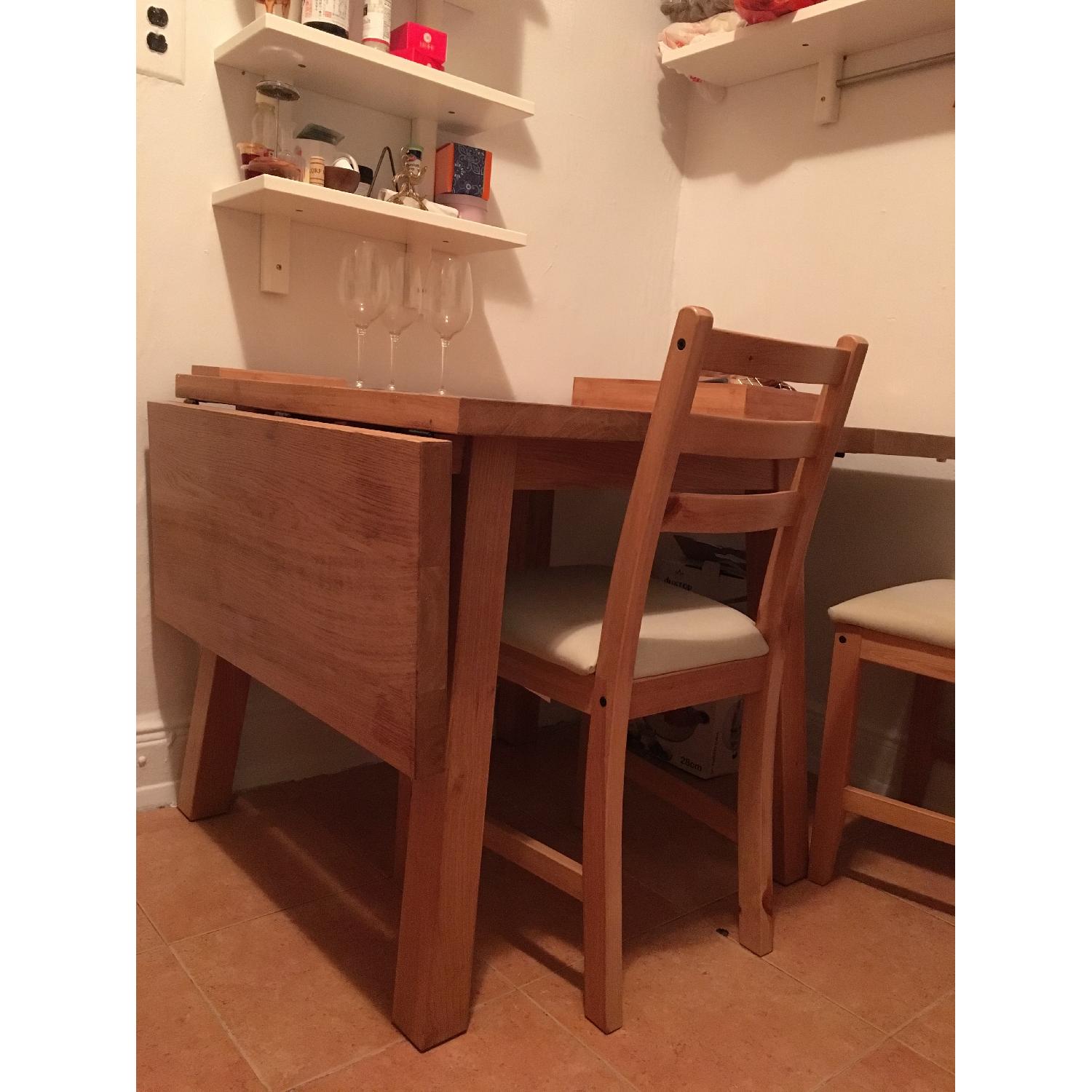Ikea Solid Oak Wood Drop-Leaf Dining Table w/ 4 Chairs - AptDeco
