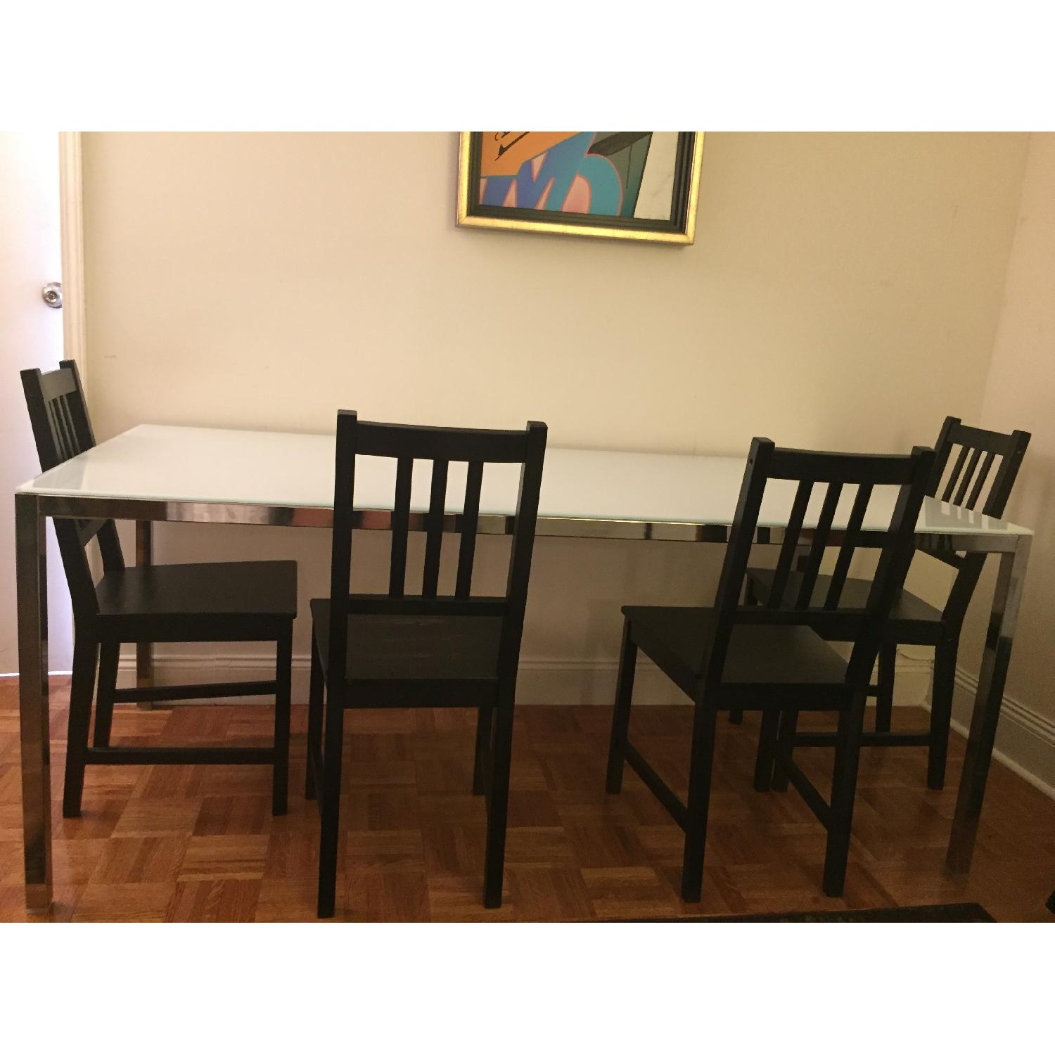 Ikea Glass Top/Steel Frame Dining Table w/ 4 Wood Chairs - image-1