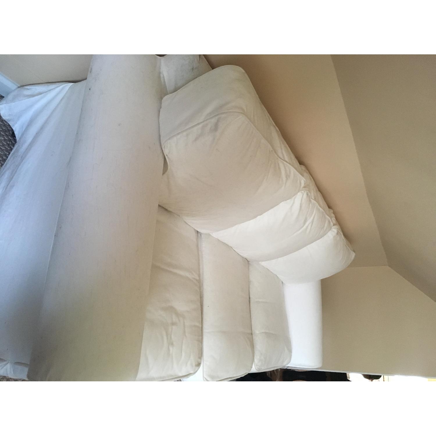 White Slipcovered Sofa - image-1