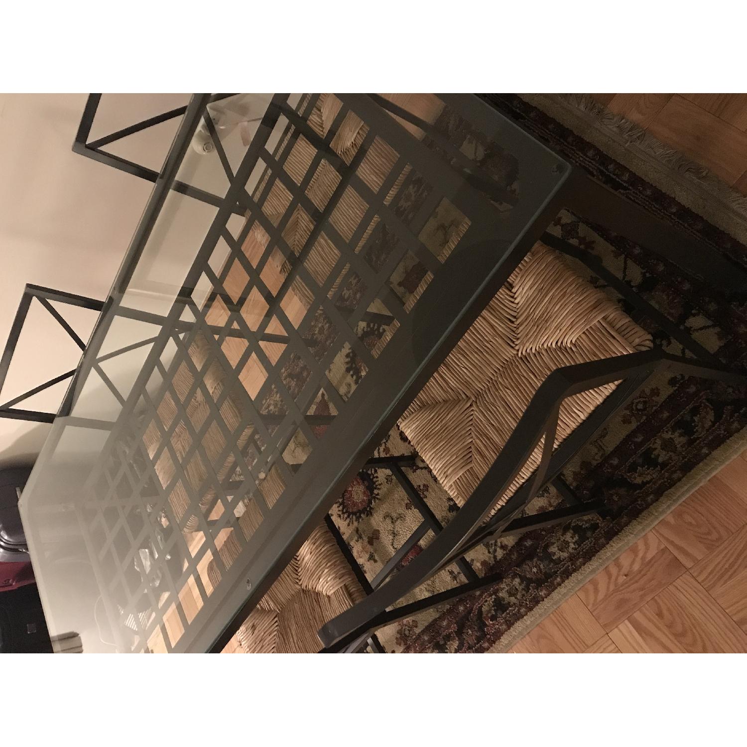 Ikea Glass Top Dining Table w/ 4 Rattan Seat Dining Chairs AptDeco