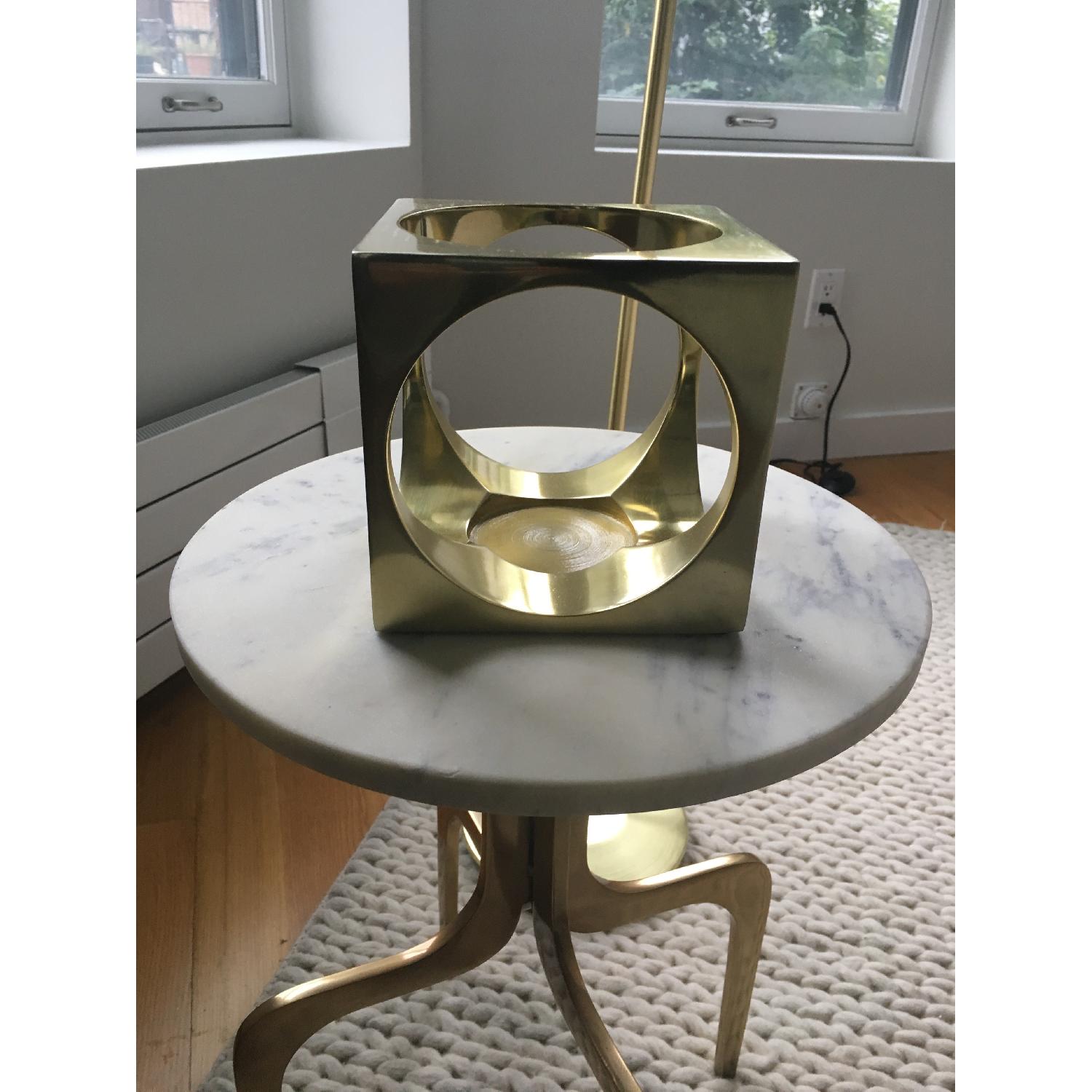 CB2 Hole in the Wall Brass Candle Holders AptDeco