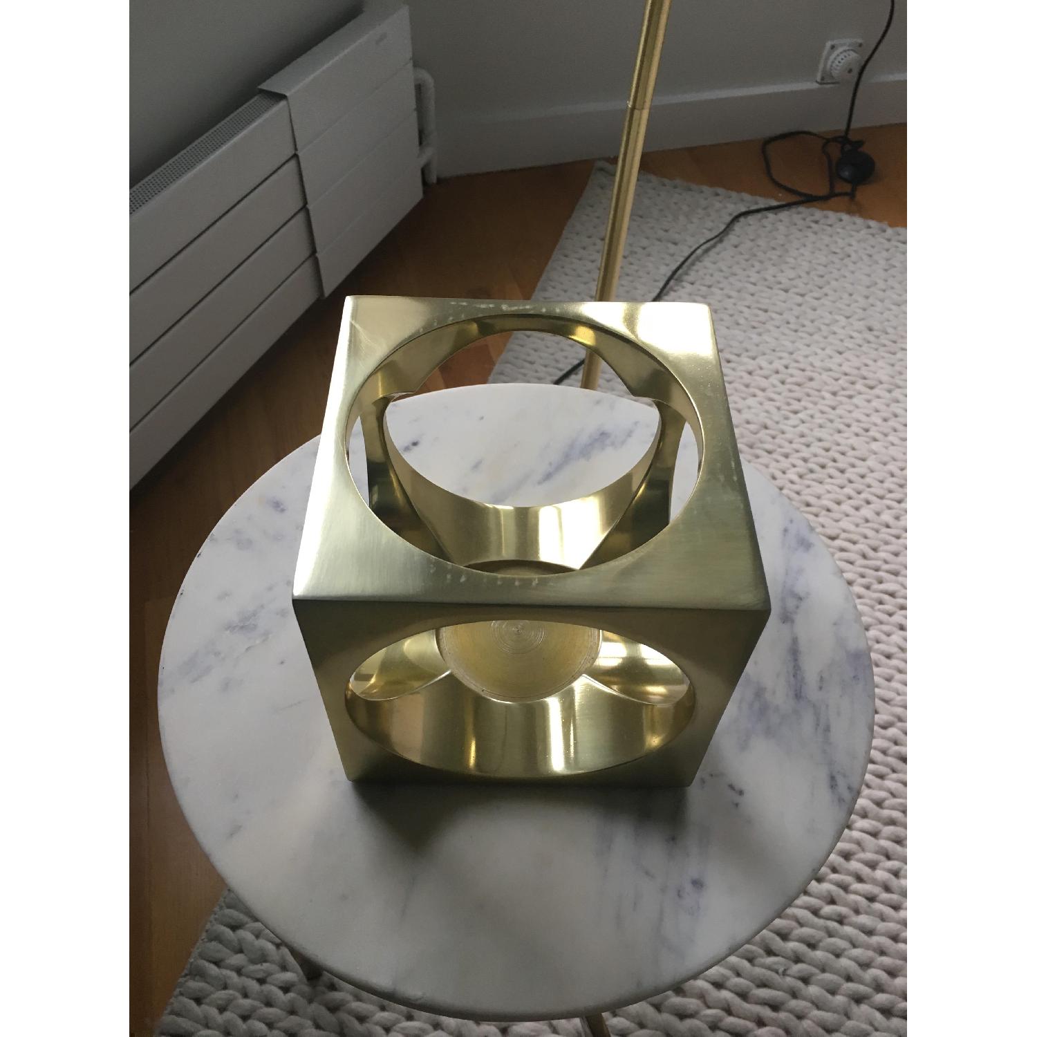 CB2 Hole in the Wall Brass Candle Holders AptDeco