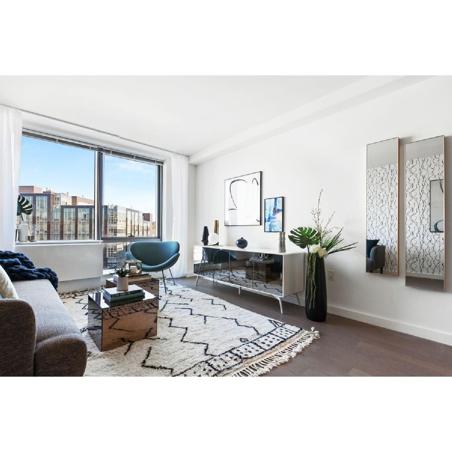 CB2 Infinity Narrow Wall Mirror in Brass - image-5