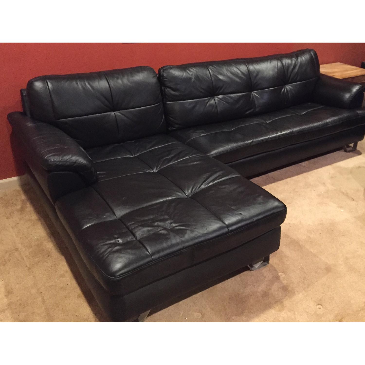 Ashley's Black Leather Sectional Sofa - image-1