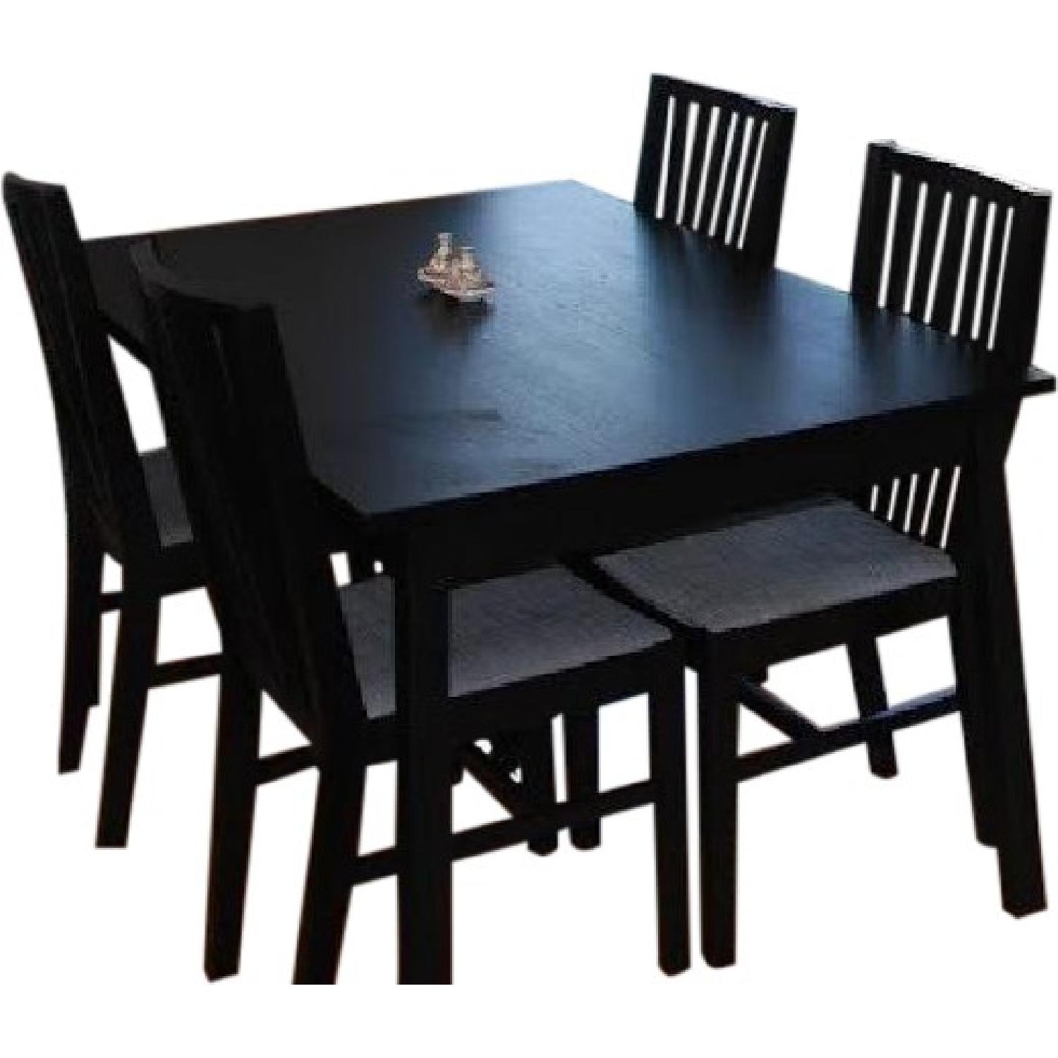 Ikea Black Bjursta Extendable Table w/ 4 Brje Chairs w/ Cushions - AptDeco