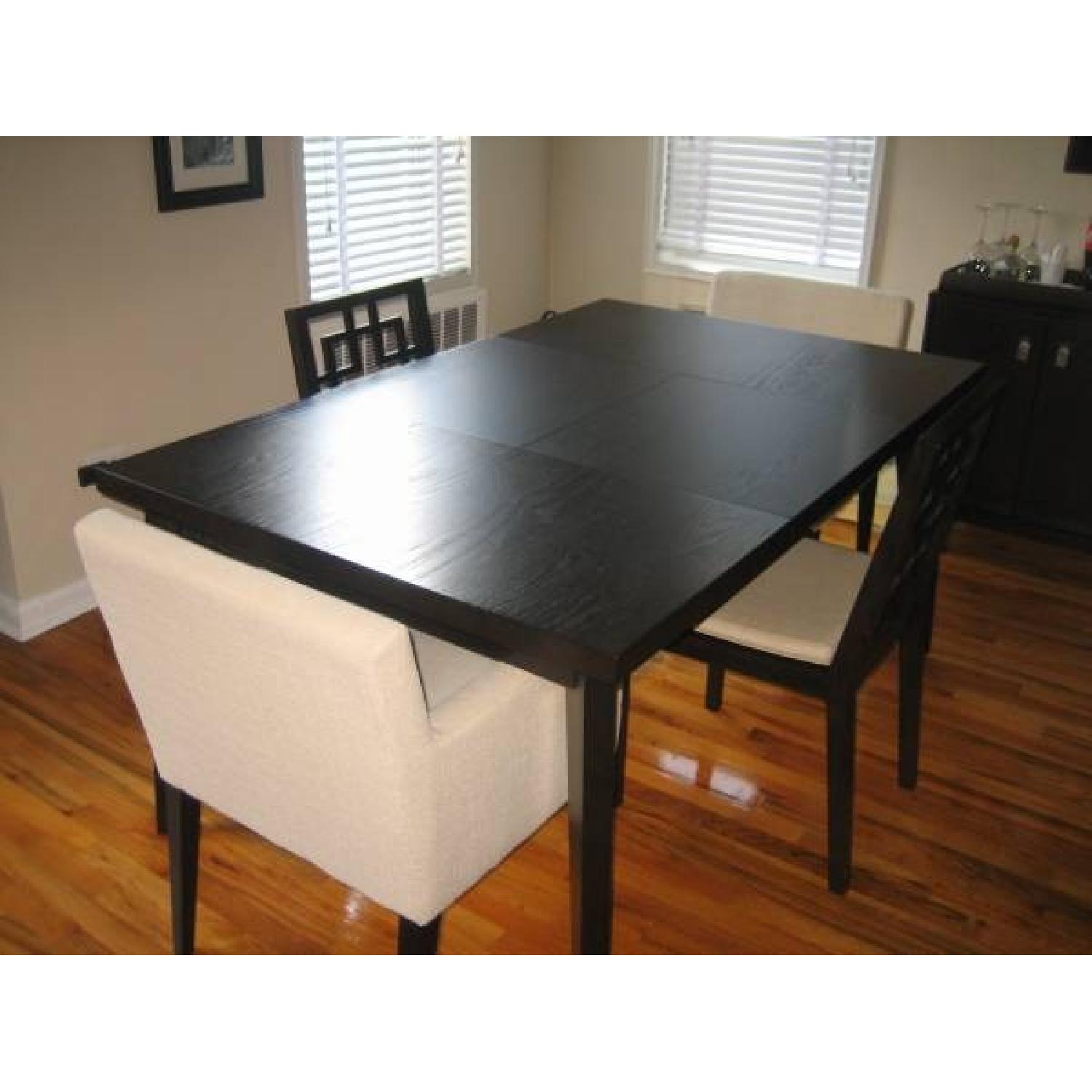 Expandable Dining Room Table w/ 4 Chairs + Hutch - image-1