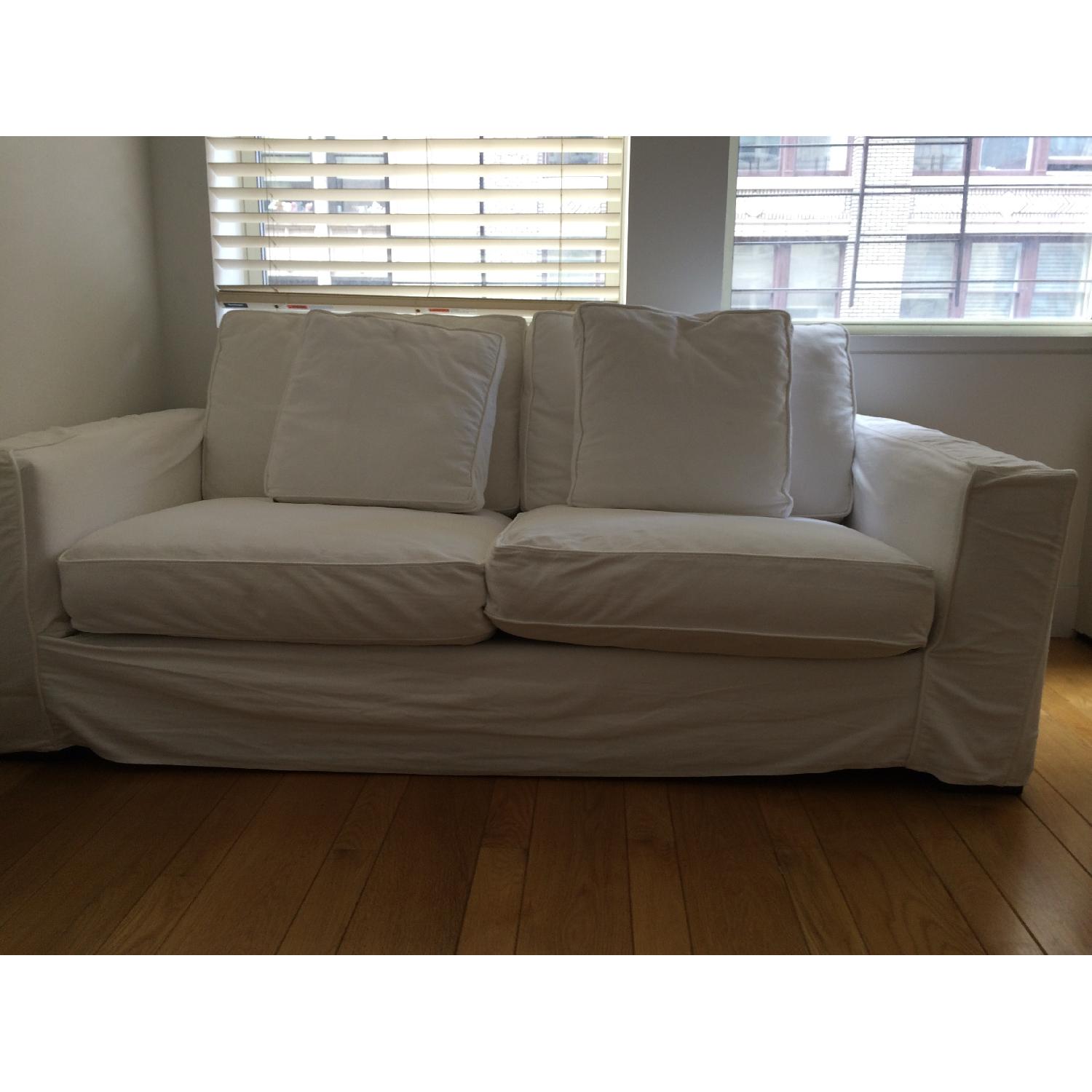 White Linen Slipcovered Sofa w/ 2 Throw Pillows - image-1
