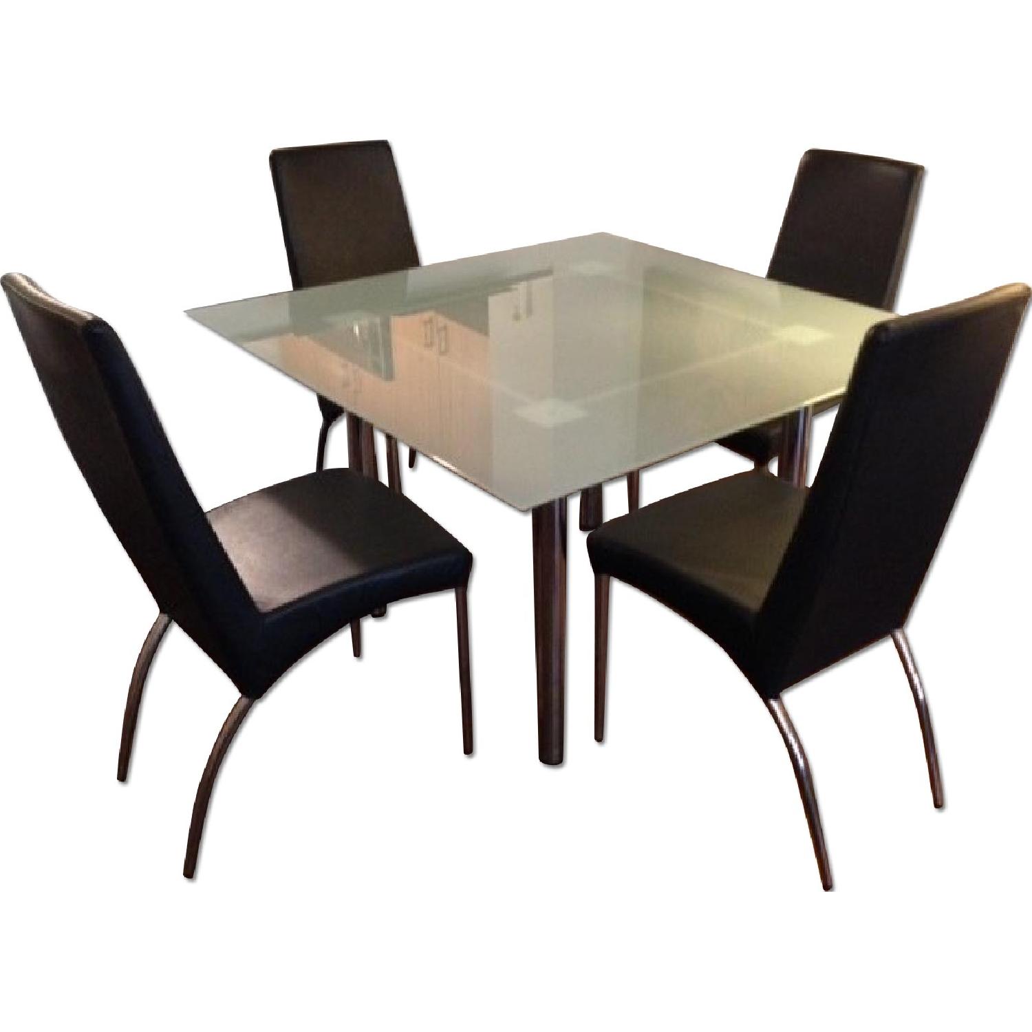 Glass Table w/ 4 Leather Chairs - AptDeco