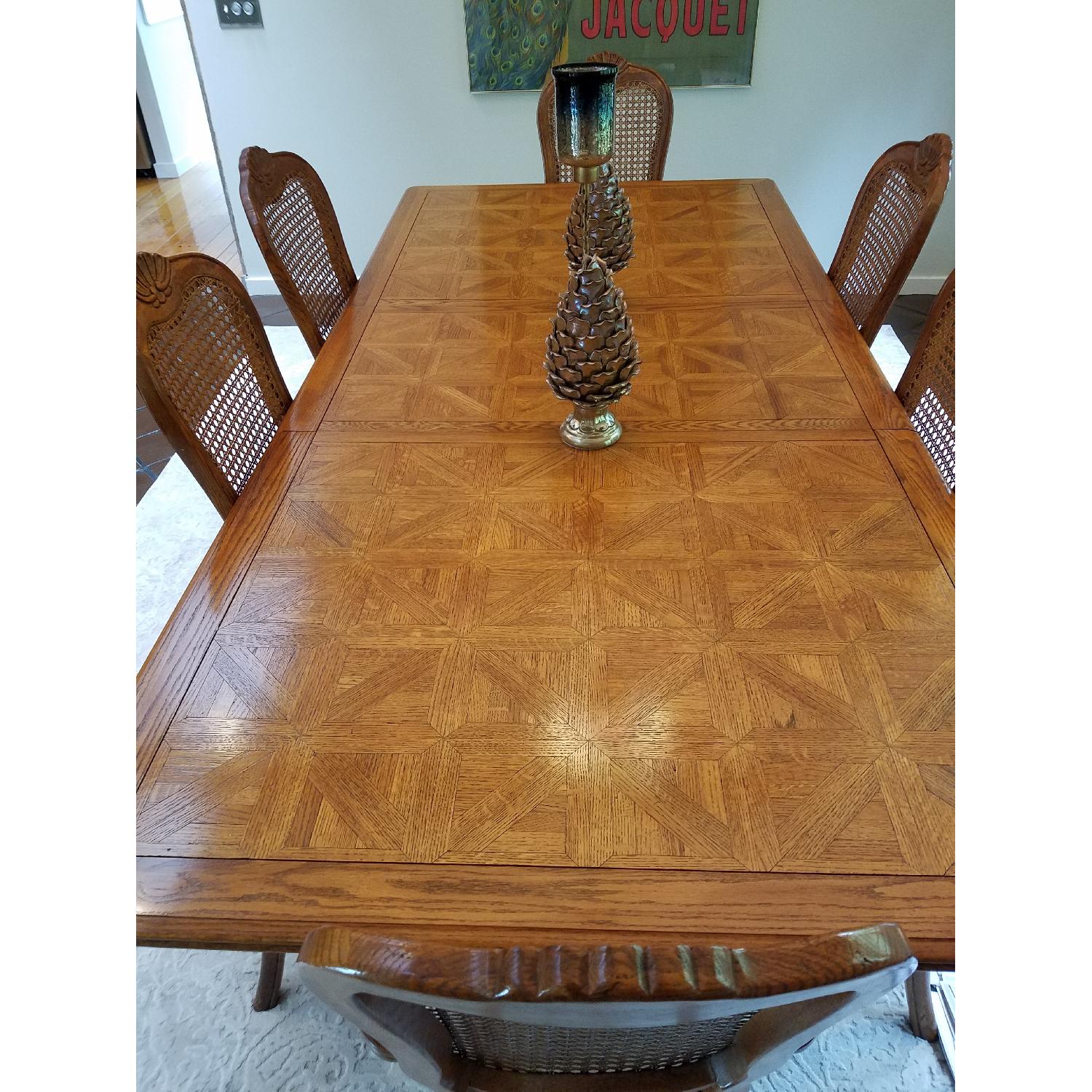 Baker Solid Oak Expandable Dining Table w/ 6 Chairs - AptDeco