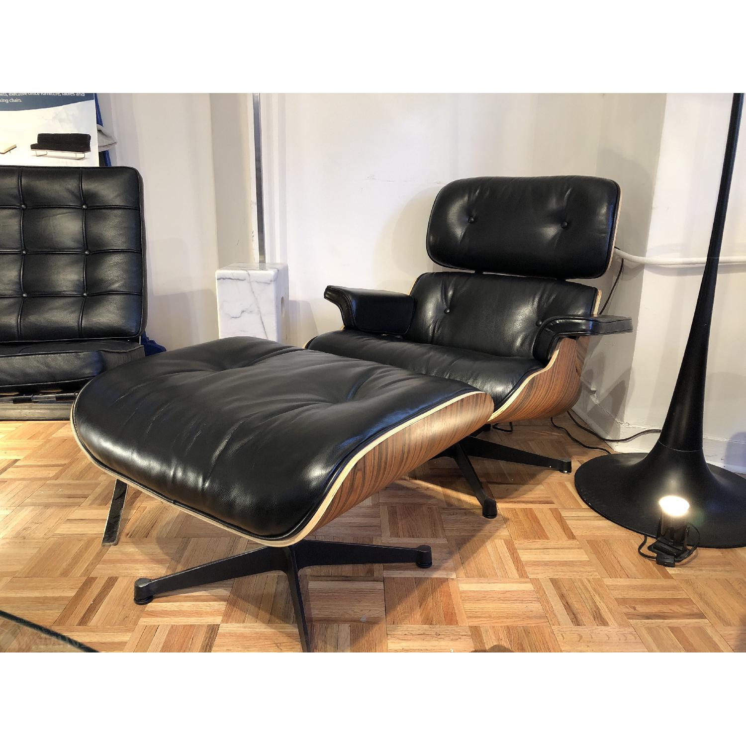 Eames Lounge Chair Reproduction in Black Aniline Leather AptDeco