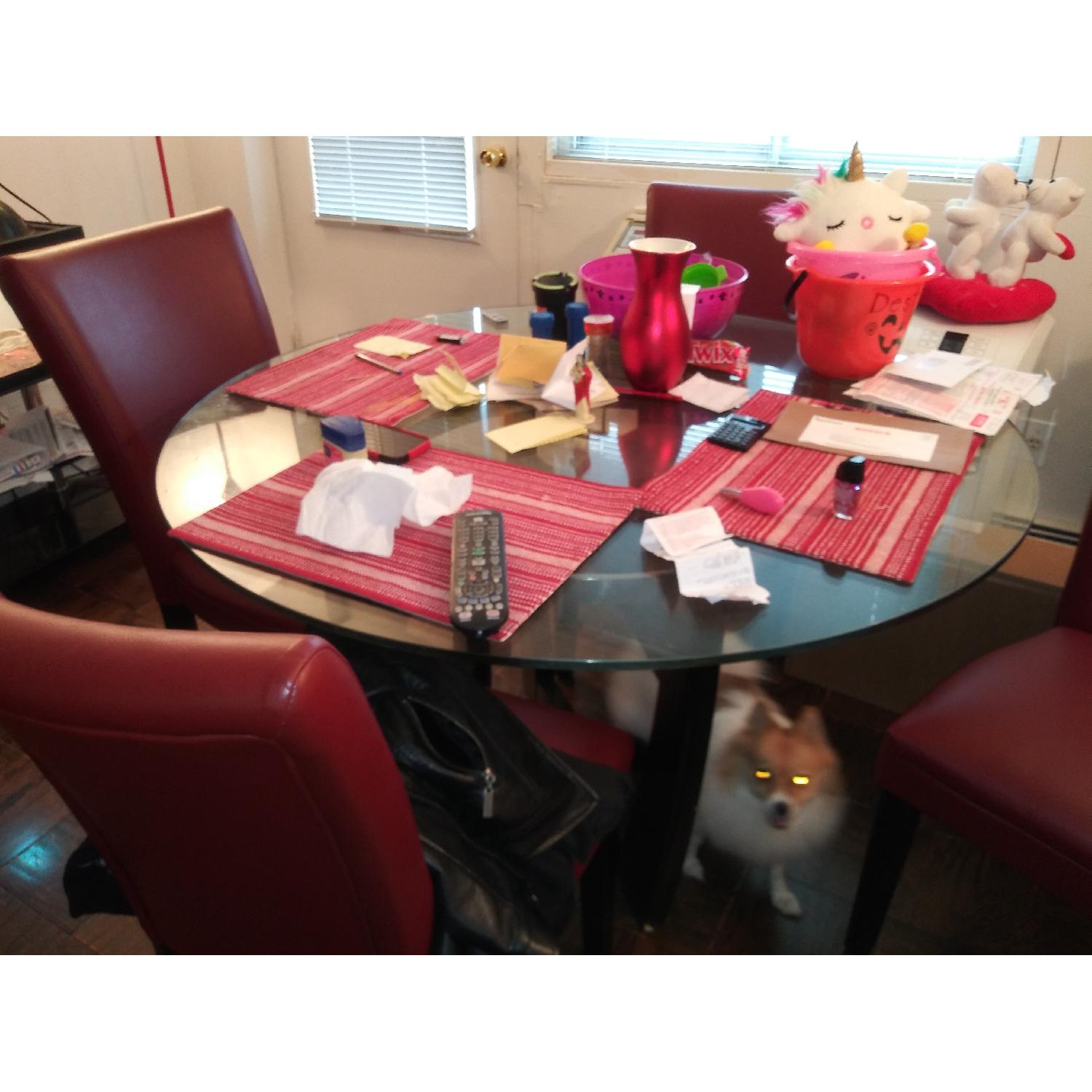Bob's Glass Dining Table w/ 4 Red Leather Chairs AptDeco