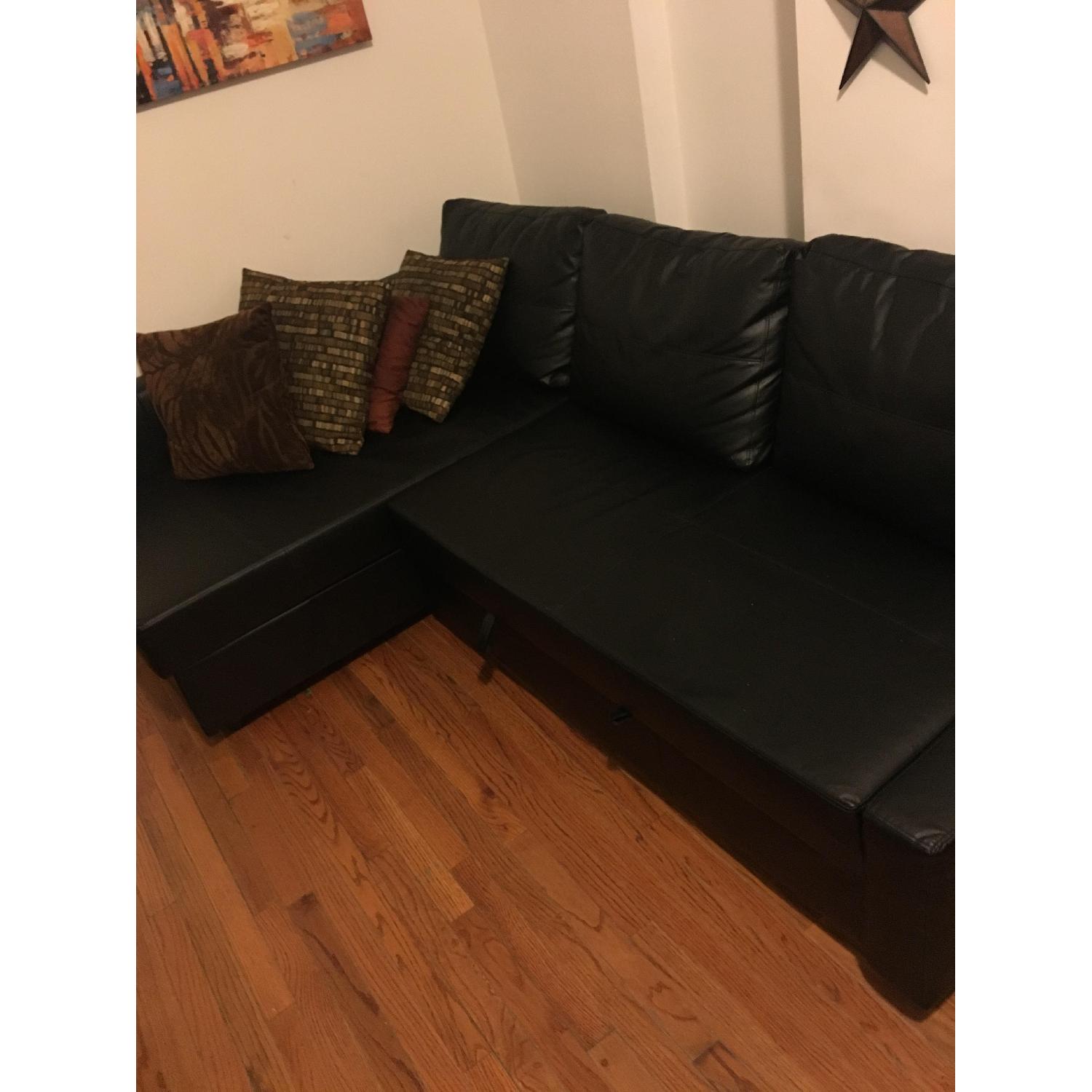 Ikea Leather Sectional w/ Pull Out Bed AptDeco