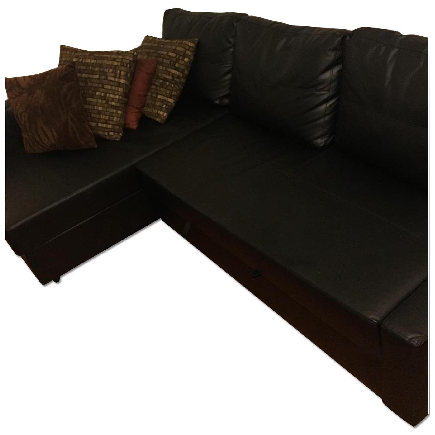 Ikea Leather Sectional w/ Pull Out Bed AptDeco
