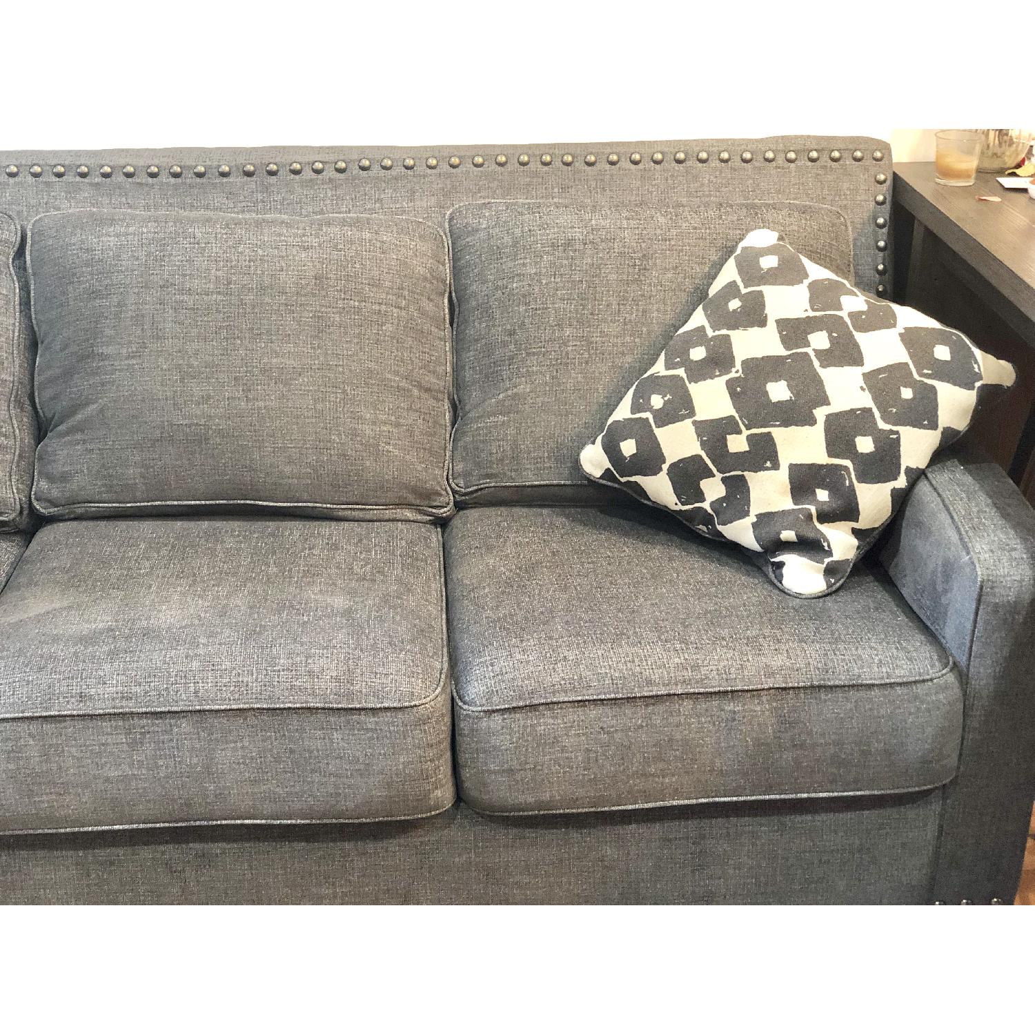 Ashley Brace Sofa & Ottoman - image-4