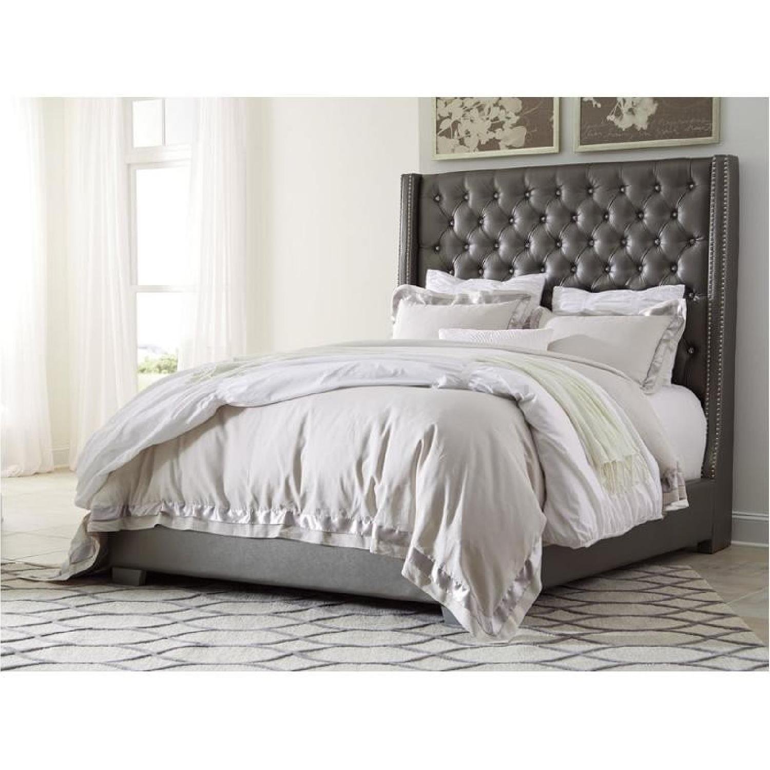 Ashley Coralayne King Upholstered Bed - image-1