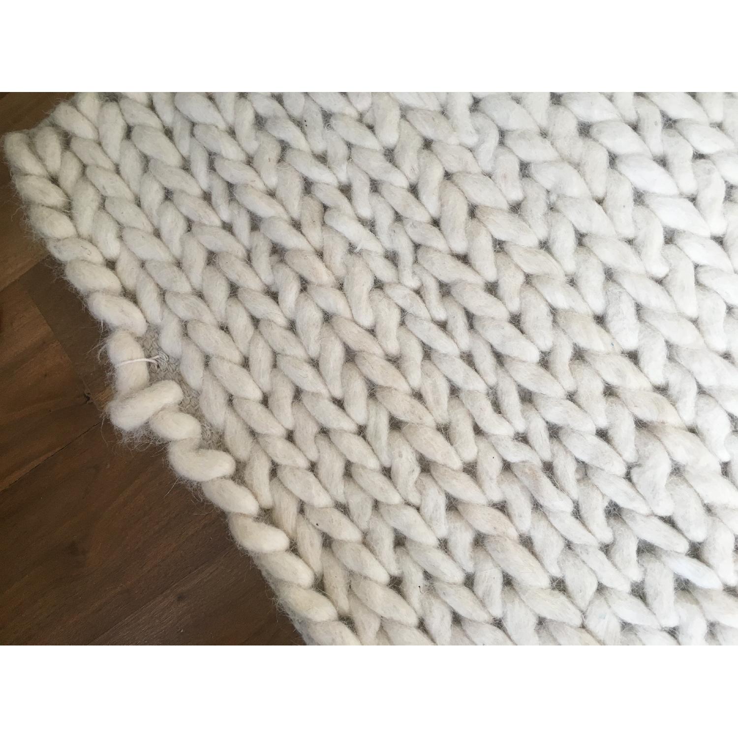 Rugs USA OffWhite Braided Area Rug AptDeco