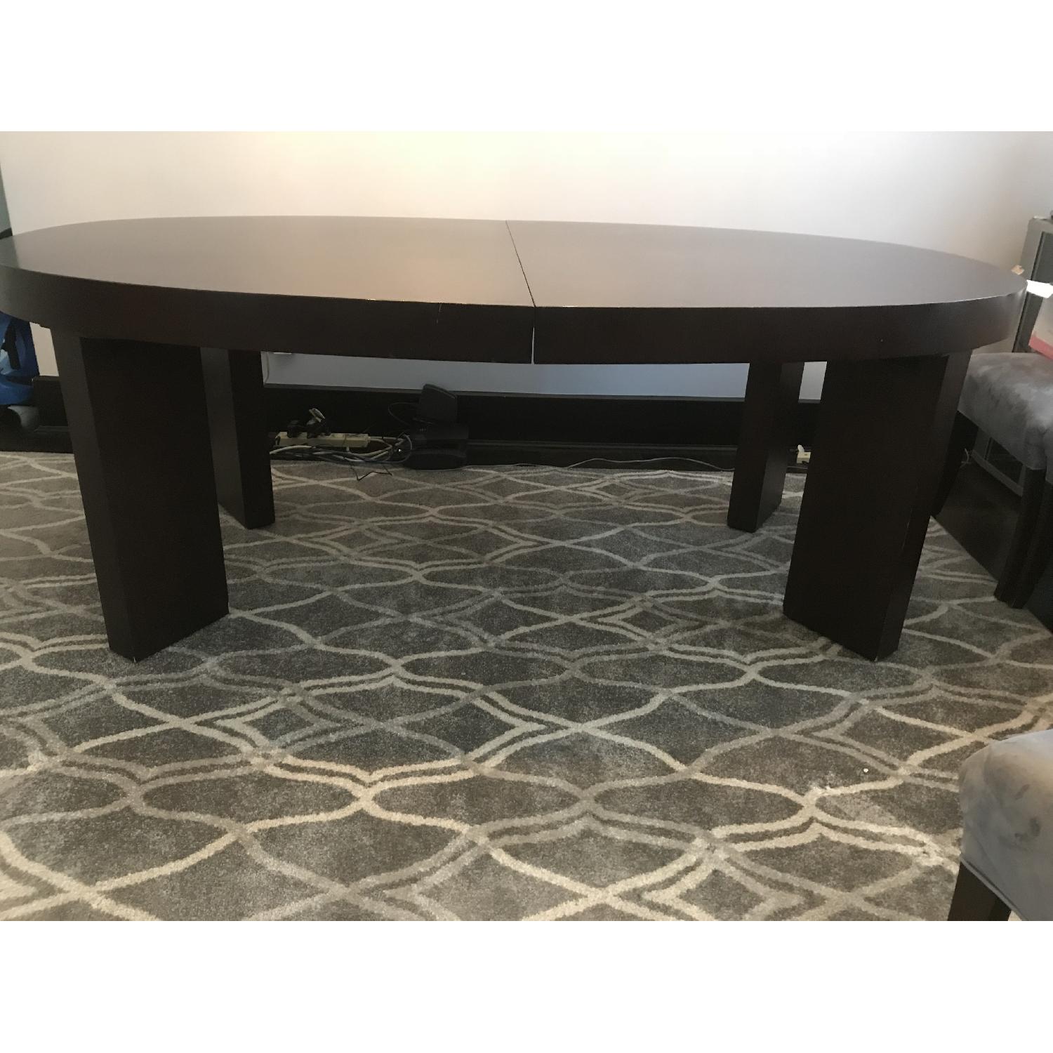 Dark Wood Dining Table w/ 2 Leaves - AptDeco
