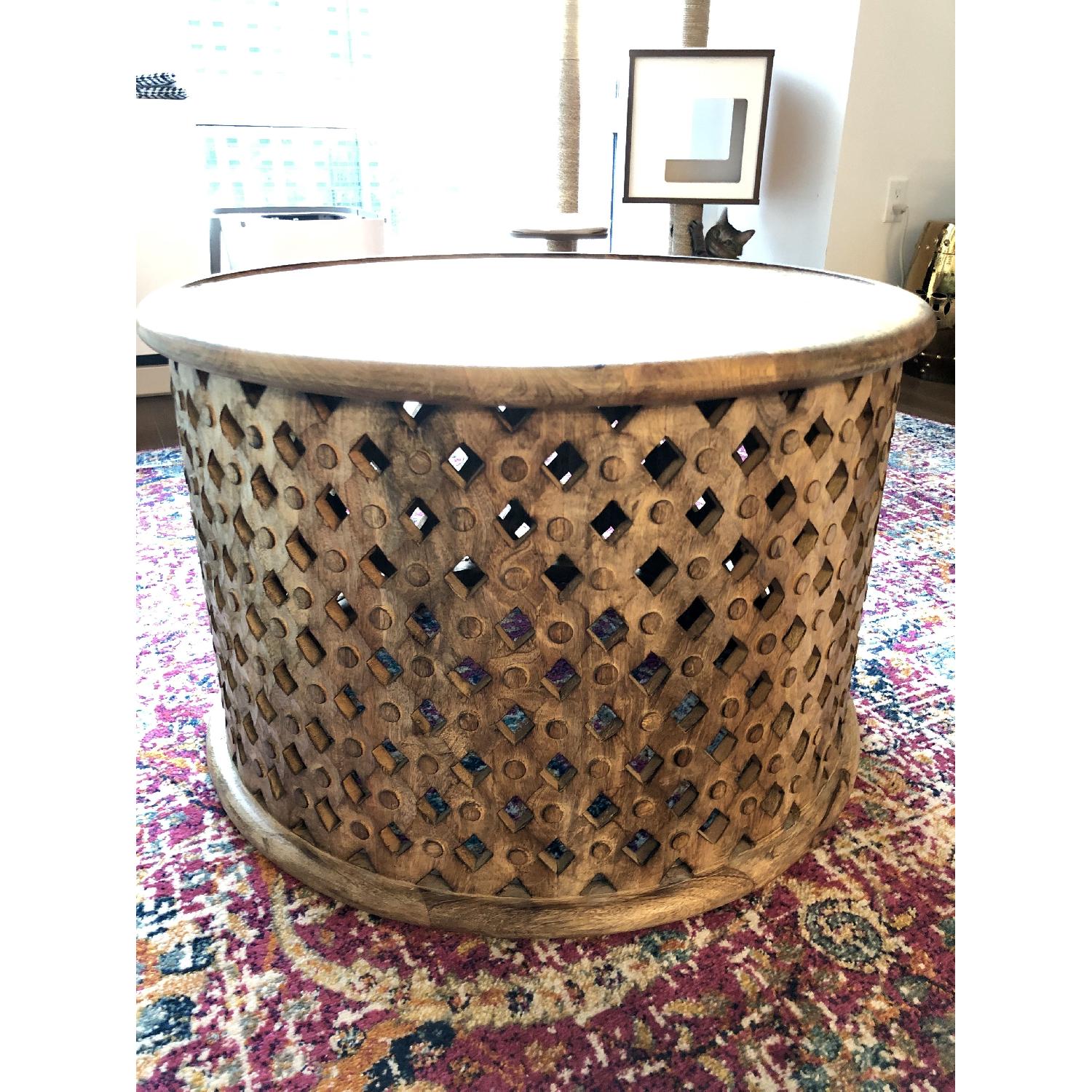 World Market Carved Mango Wood Round Coffee Table - image-1