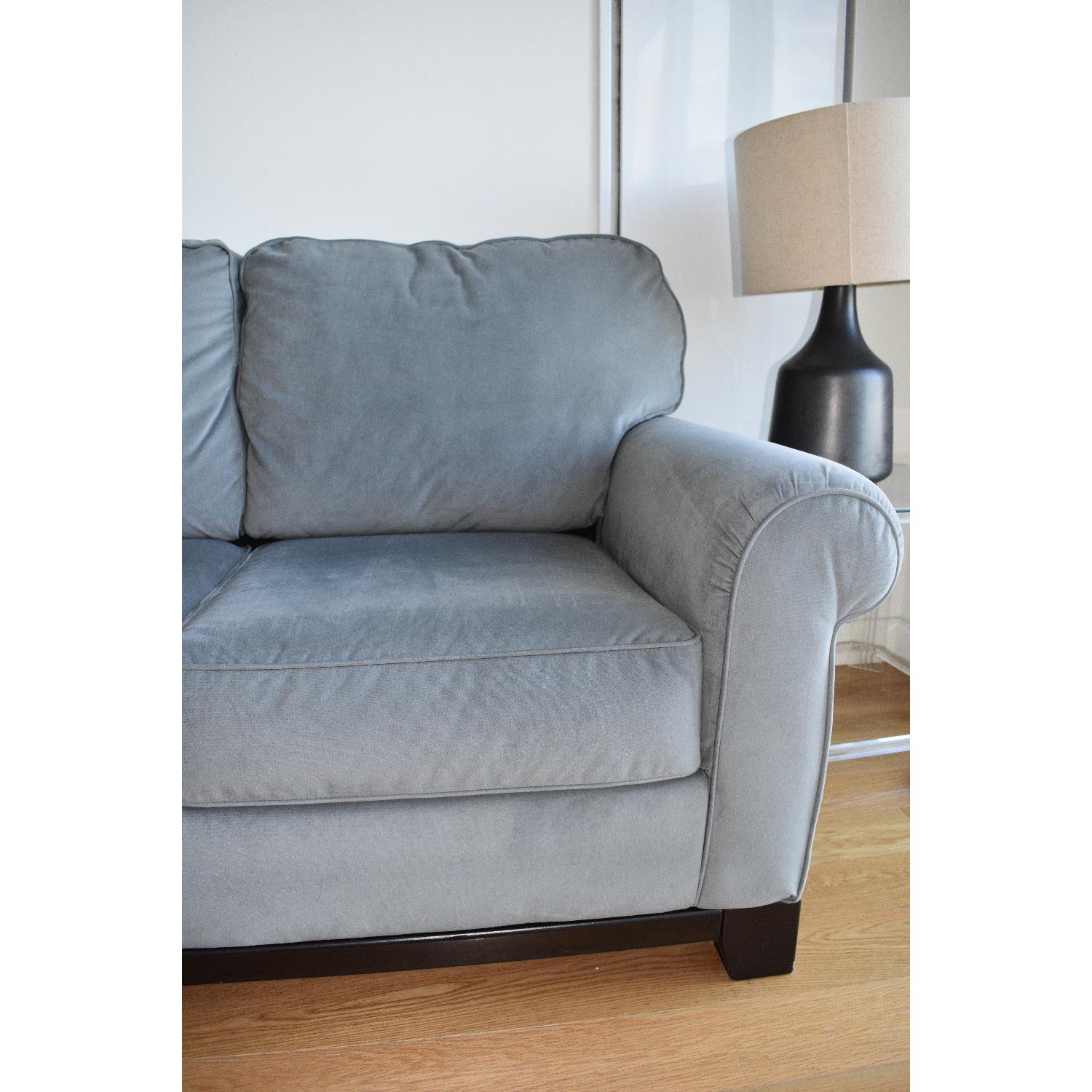 Jennifer Convertibles Sleeper Sectional w/ Reversible Chaise AptDeco