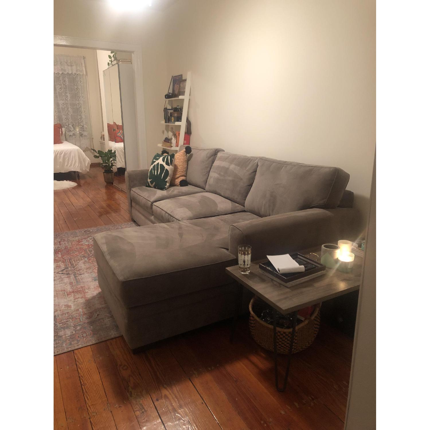 Raymour & Flanigan Artemis Sleeper Sectional Sofa w/ Chaise - AptDeco