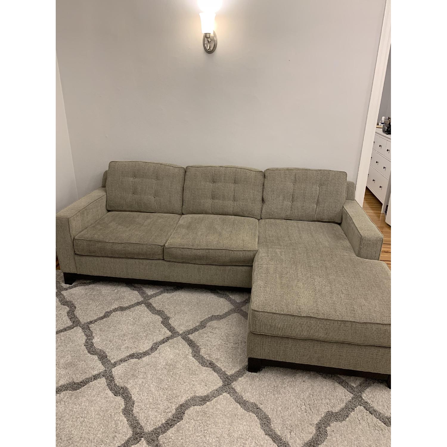 Macy's Clarke Sleeper Sectional Sofa w/ Reversible Chaise AptDeco