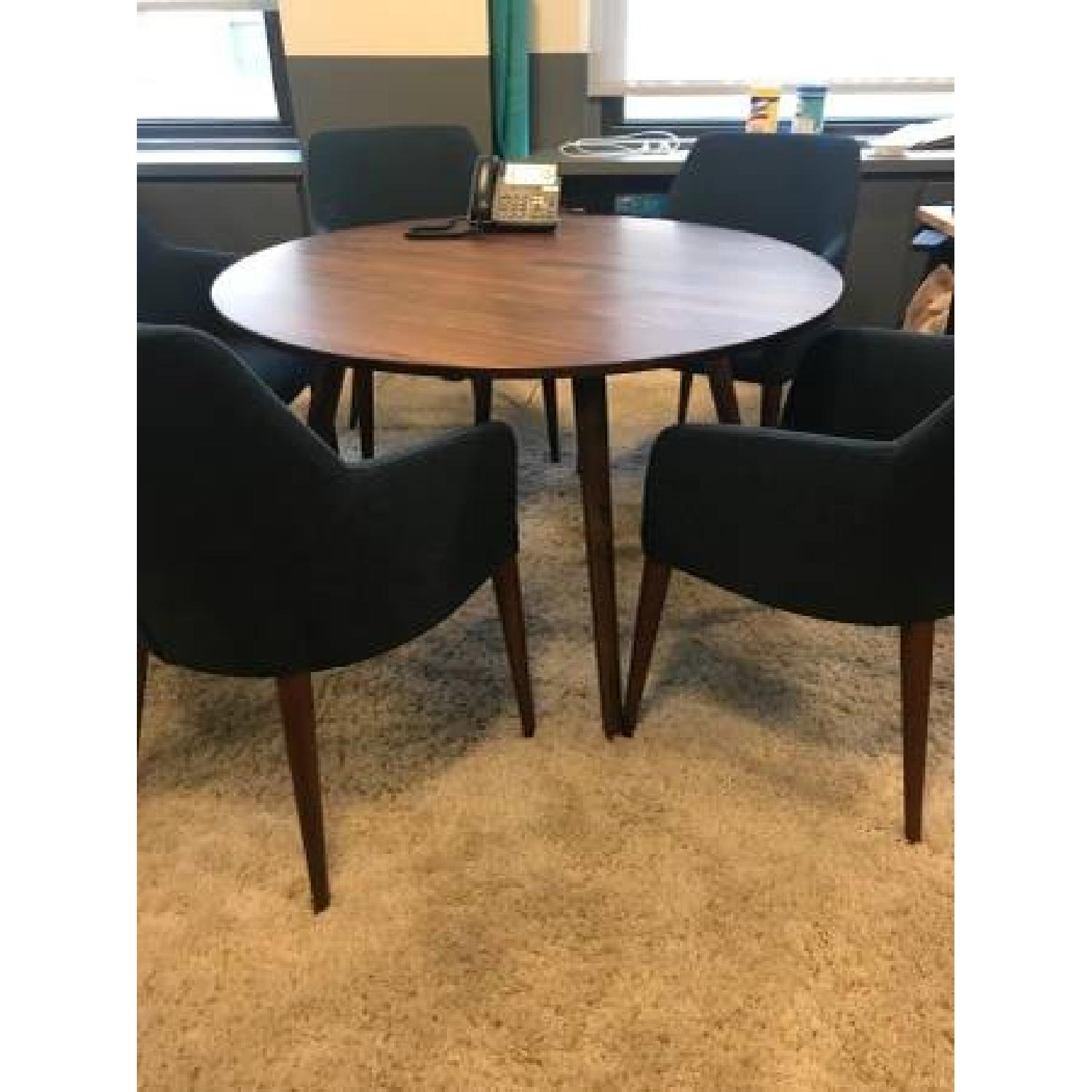 Article Mid Century Modern Round Solid Wood Dining Table - AptDeco