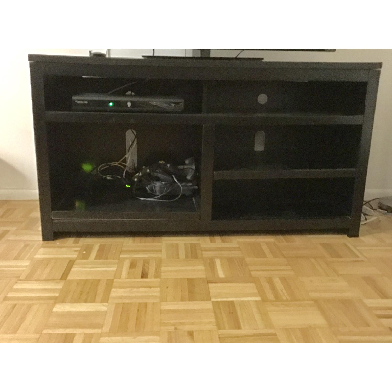 Ashley's Dark Brown TV Stand - image-1