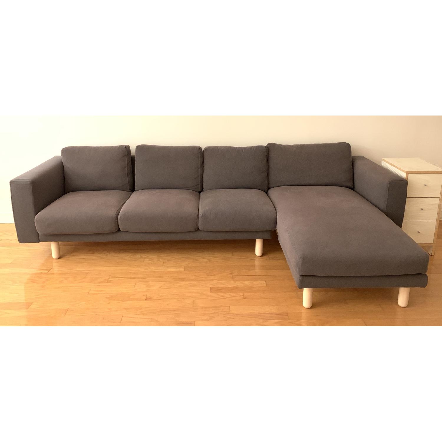 Ikea 4-Seater Sectional Sofa w/ Chaise in Dark Gray/Wood - image-1