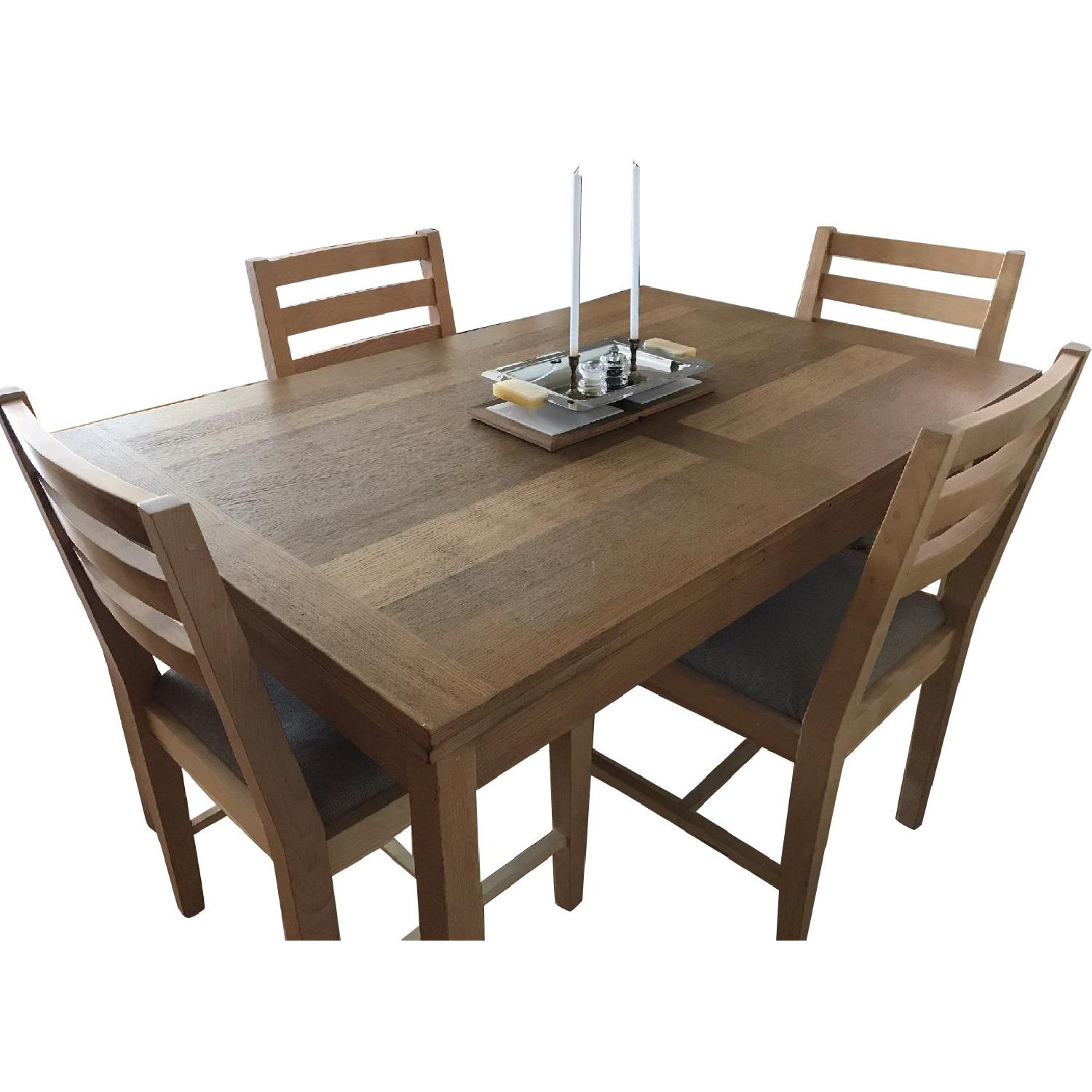 Pottery Barn Dining Table w/ 6 Upholstered Side Chairs - AptDeco