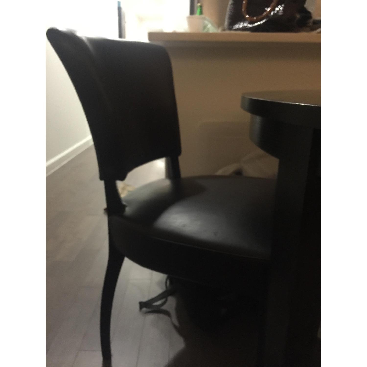 Crate & Barrel Black Ash Extendable Dining Table w/ 3 Chairs AptDeco